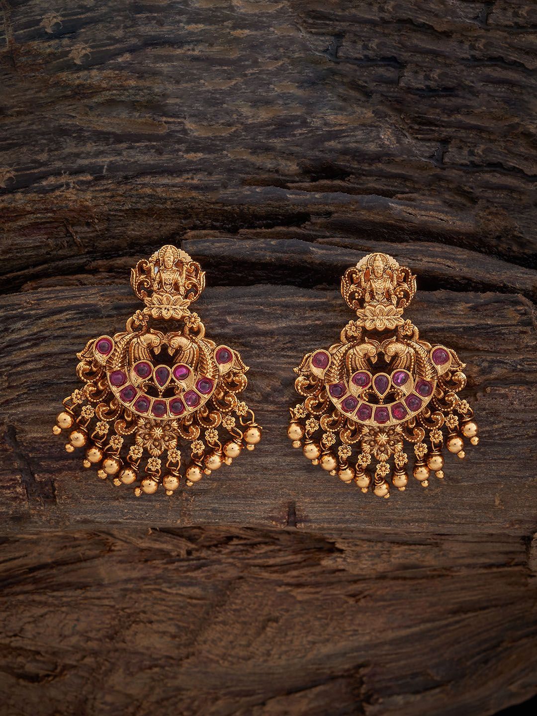 

Kushal's Fashion Jewellery Gold-Plated Stone Studded Antique Peacock Shaped Drop Earrings