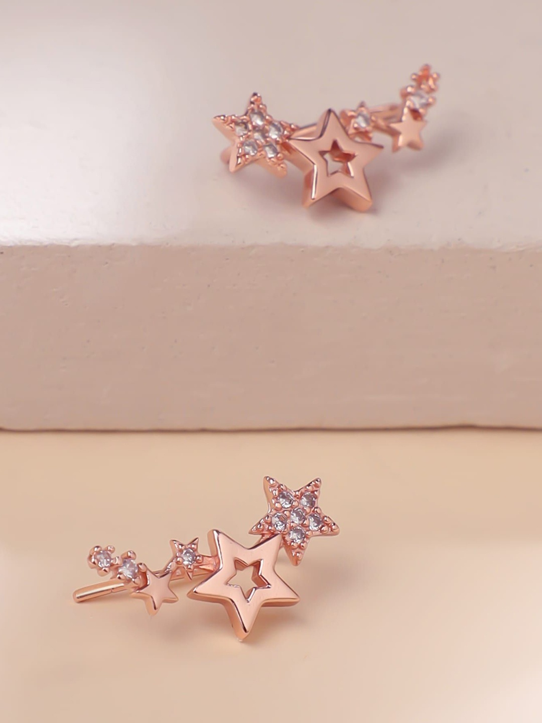 

Yellow Chimes Rose Gold Plated Star Shaped Stud Earrings