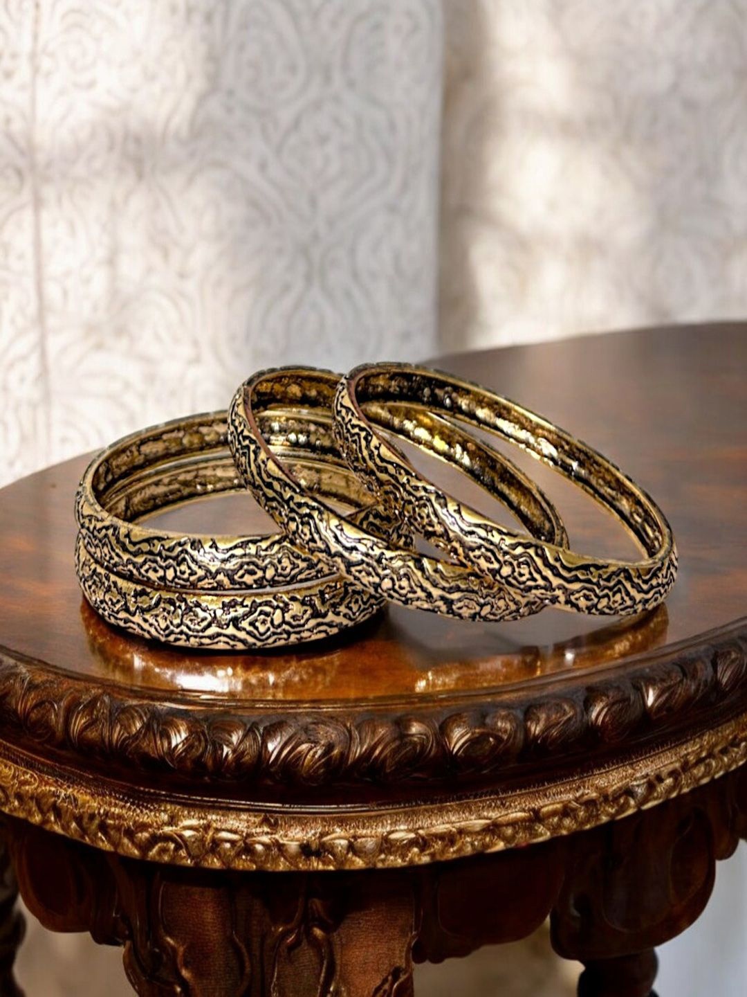 

AccessHer Set Of 4 Gold-Plated Oxidised Textured Design Bangles