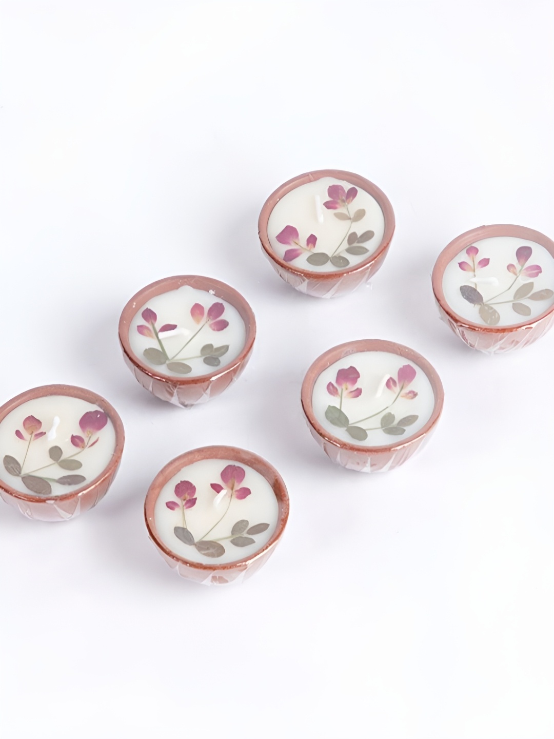 

Aromatic Fables White & Pink 6 Pieces Scented Diyas Candles