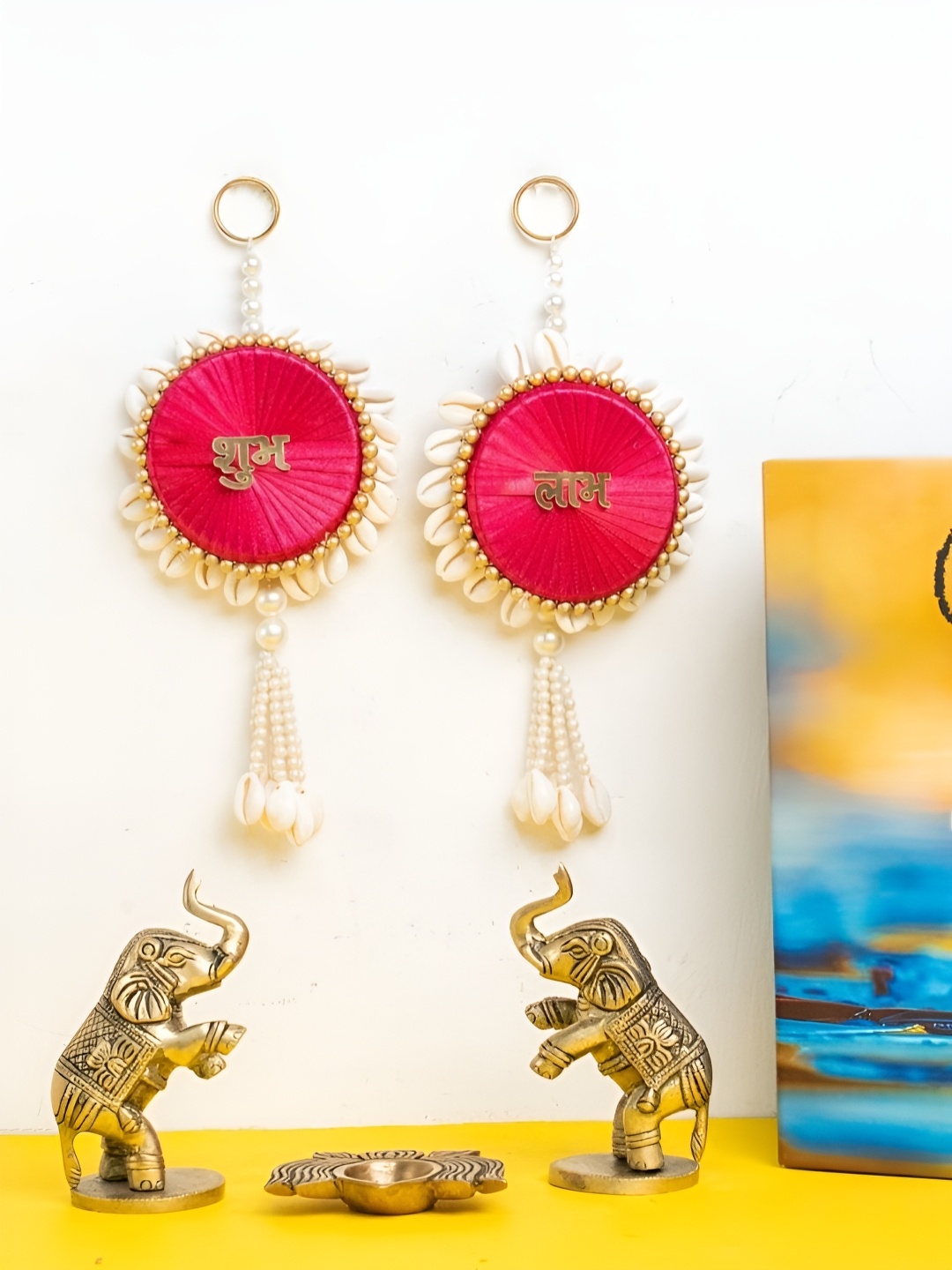 

The Advitya Brass Elephant Pair with Lotus Diya & Shubh Labh Wall Hanging Diwali Gift Set, Gold