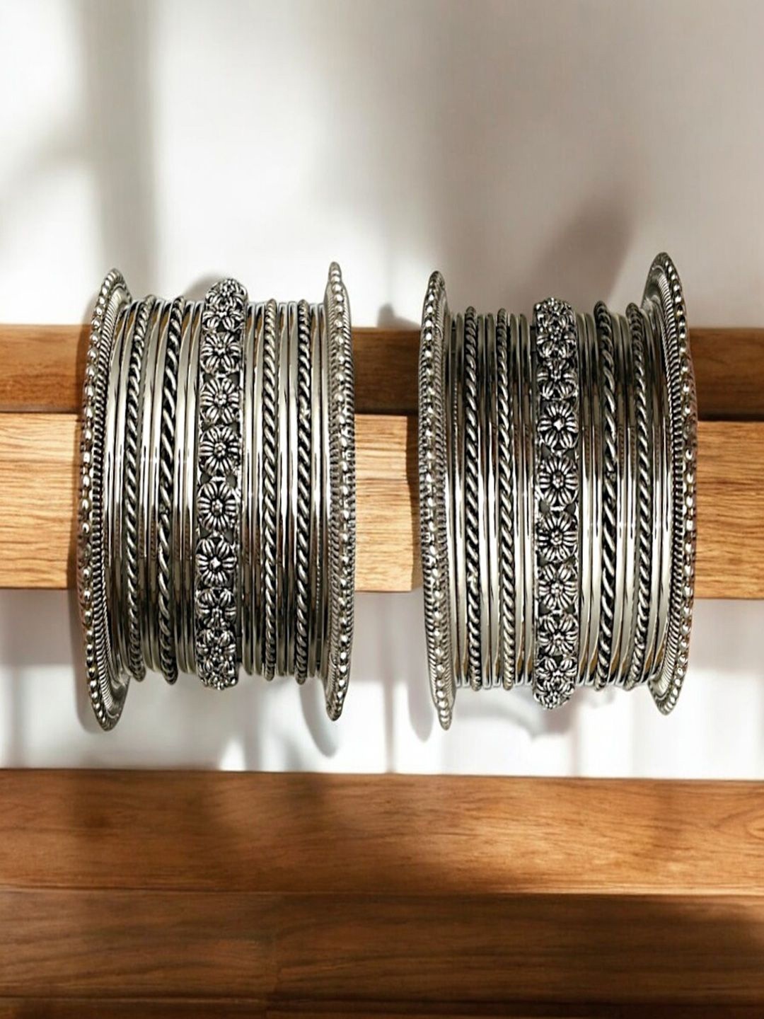 

AccessHer Set Of 18 Silver-Plated Floral Oxidised Bangles