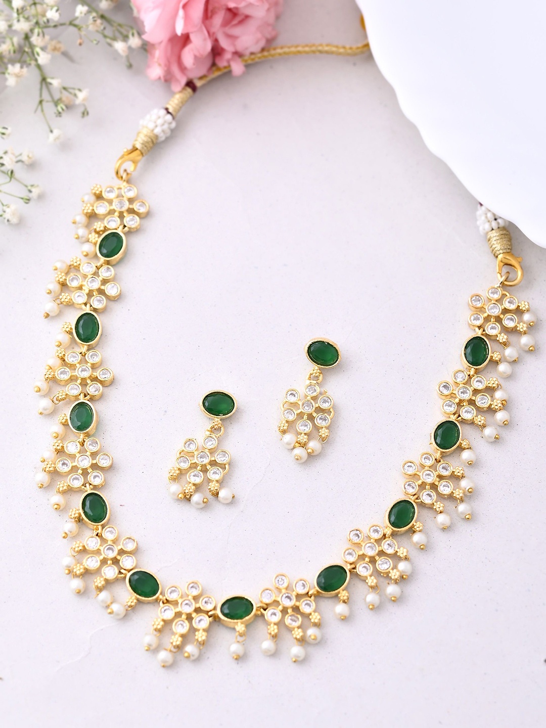 

PYR FASHION Gold Plated Kundan Stone Studded & Beaded Jewellery Set