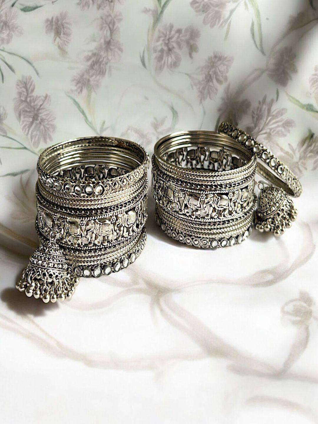 

AccessHer Set Of 18 Silver-Plated Oxidized Elephant Design Bangles