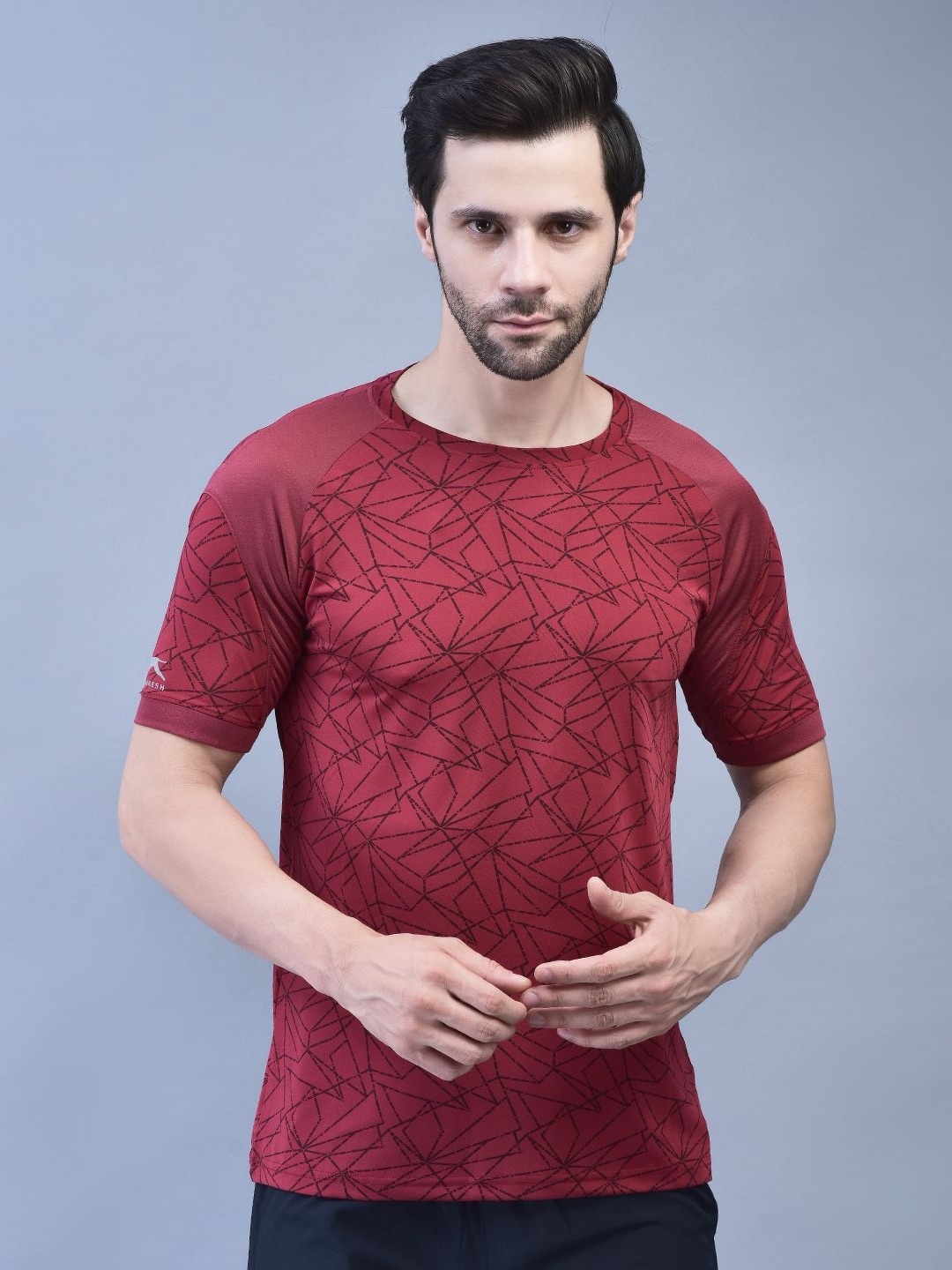 

Shiv Naresh Men Abstract Printed Round Neck Slim Fit T-shirt, Maroon