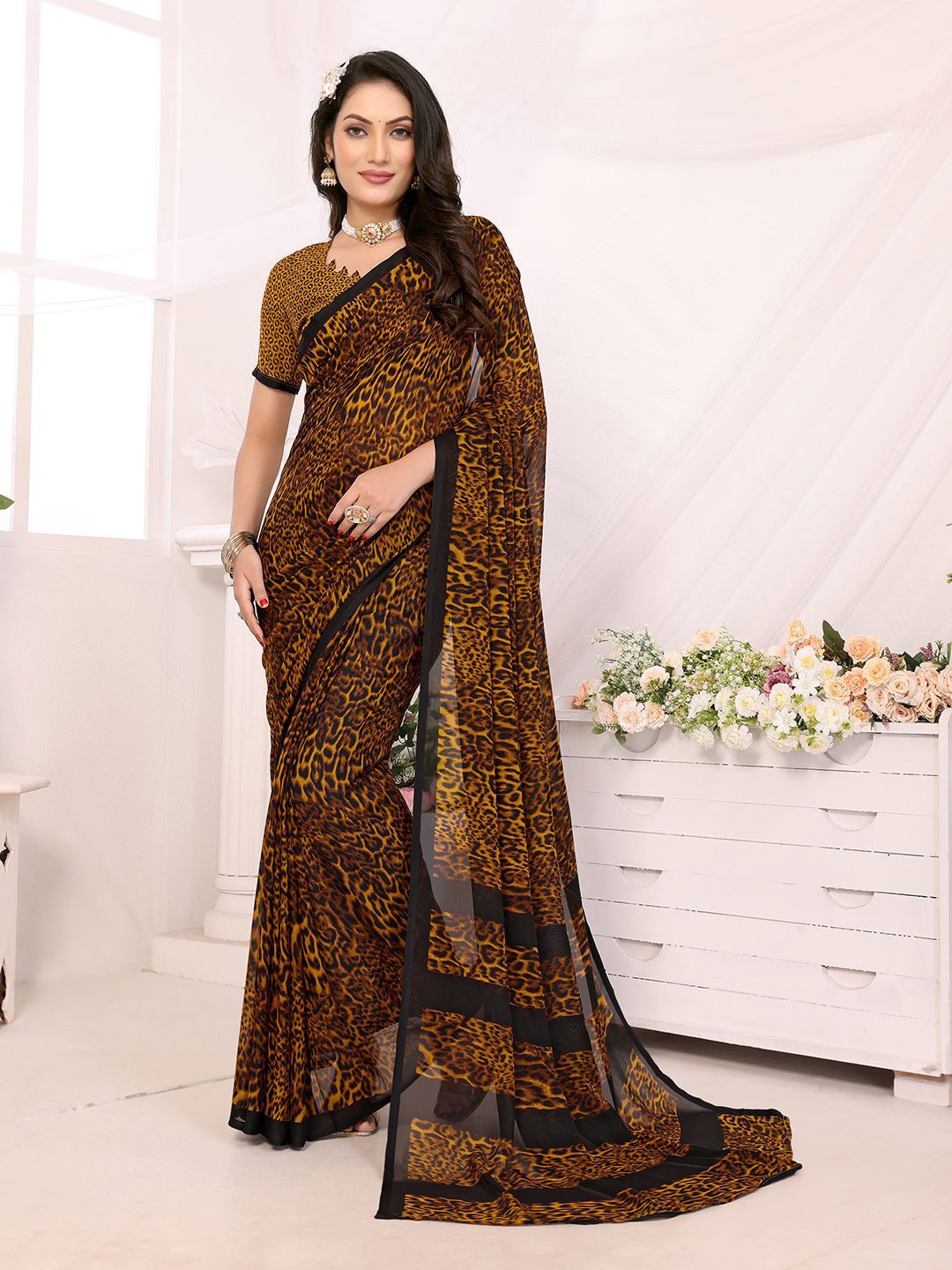 

Moda Rapido Paisley Poly Georgette Saree, Yellow