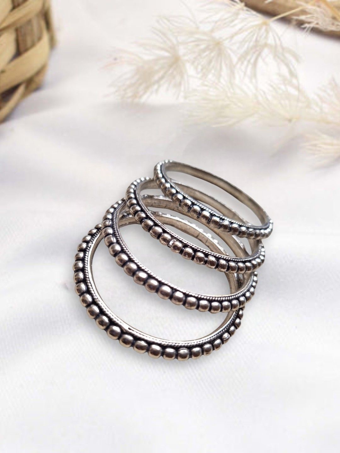 

XAGO Le Anoma Set Of 4 Silver Plated Oxidized Bangles
