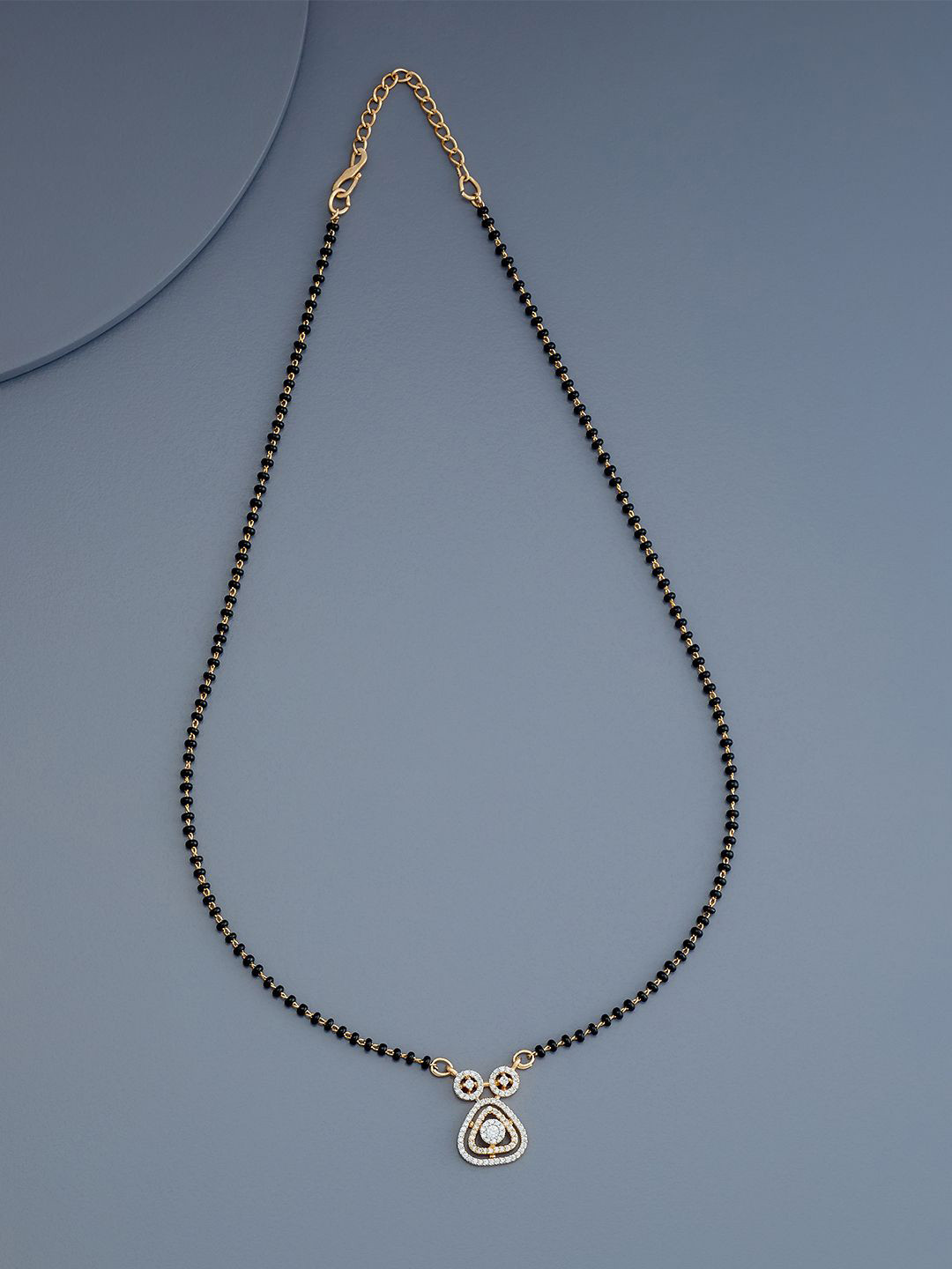 

Kushal's Fashion Jewellery Rhodium-Plated Zircon Stone Studded Mangalsutra, Gold