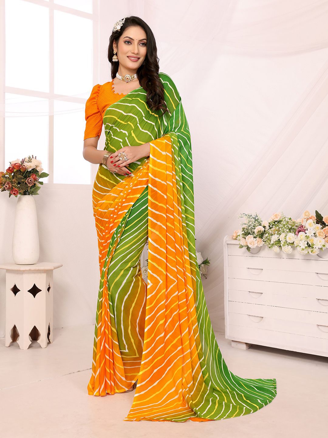 

Moda Rapido Leheriya Poly Georgette Saree, Yellow