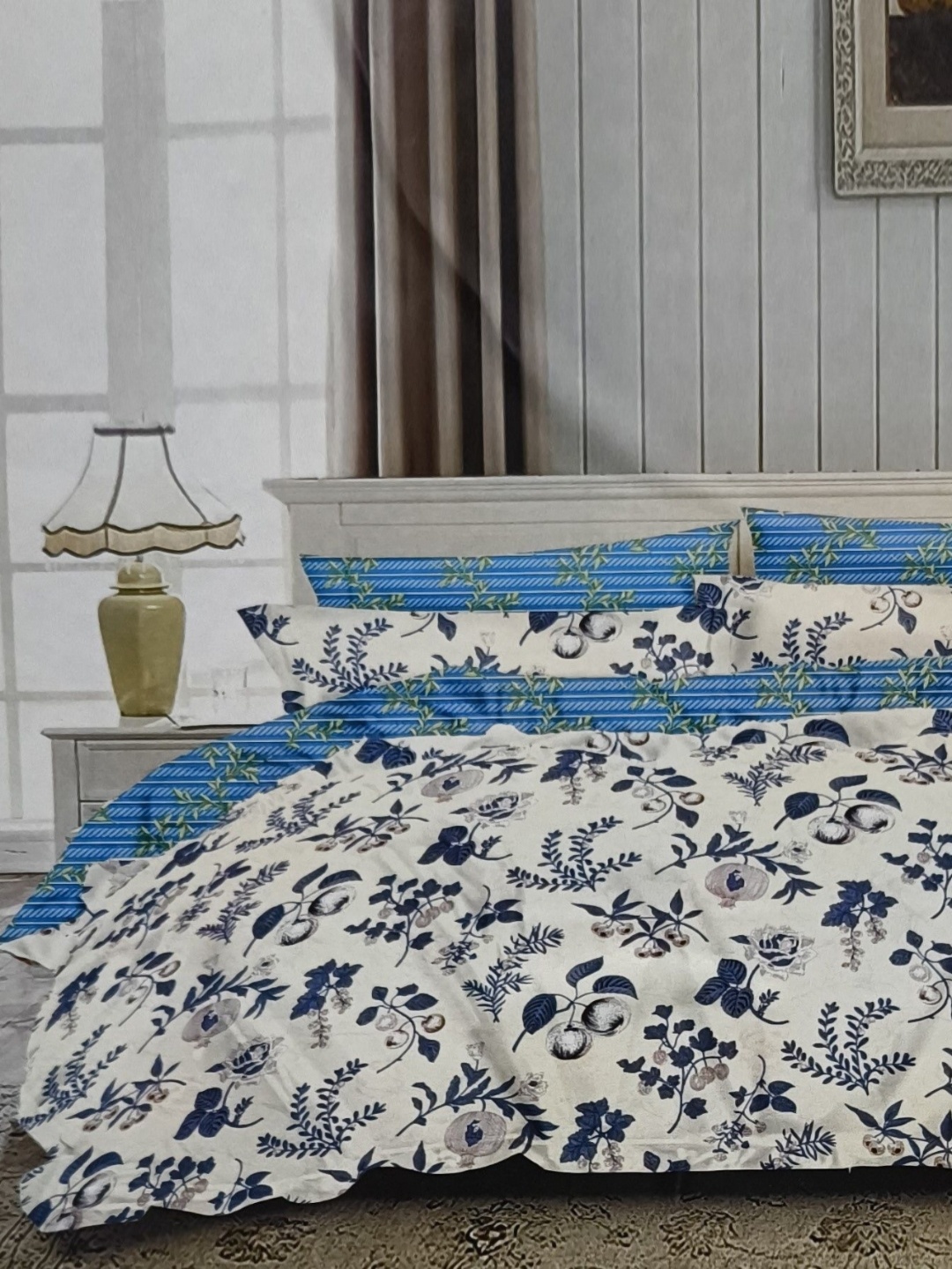 

Signature Off White & Blue Floral 144 TC Queen Bedsheet with 2 Pillow Covers
