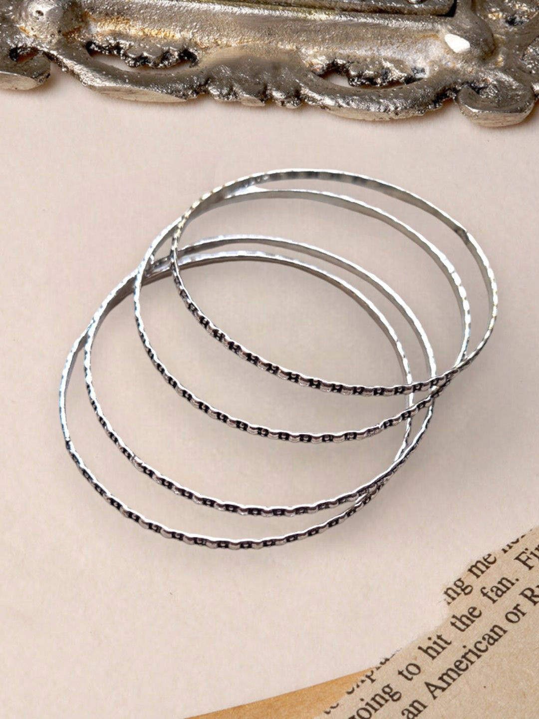 

XAGO Le Asmi Set Of 4 Silver Plated Oxidized Bangles