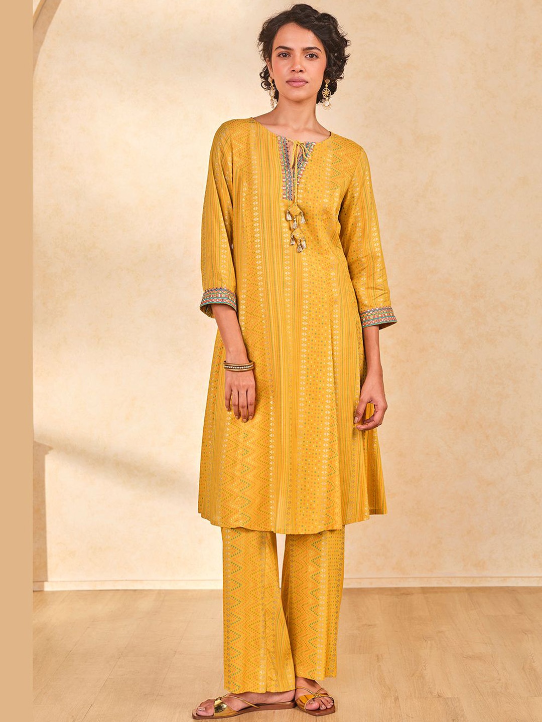 

Global Desi Floral Yoke Design Tie-Up Neck Thread Work Straight Kurta With Trousers, Mustard