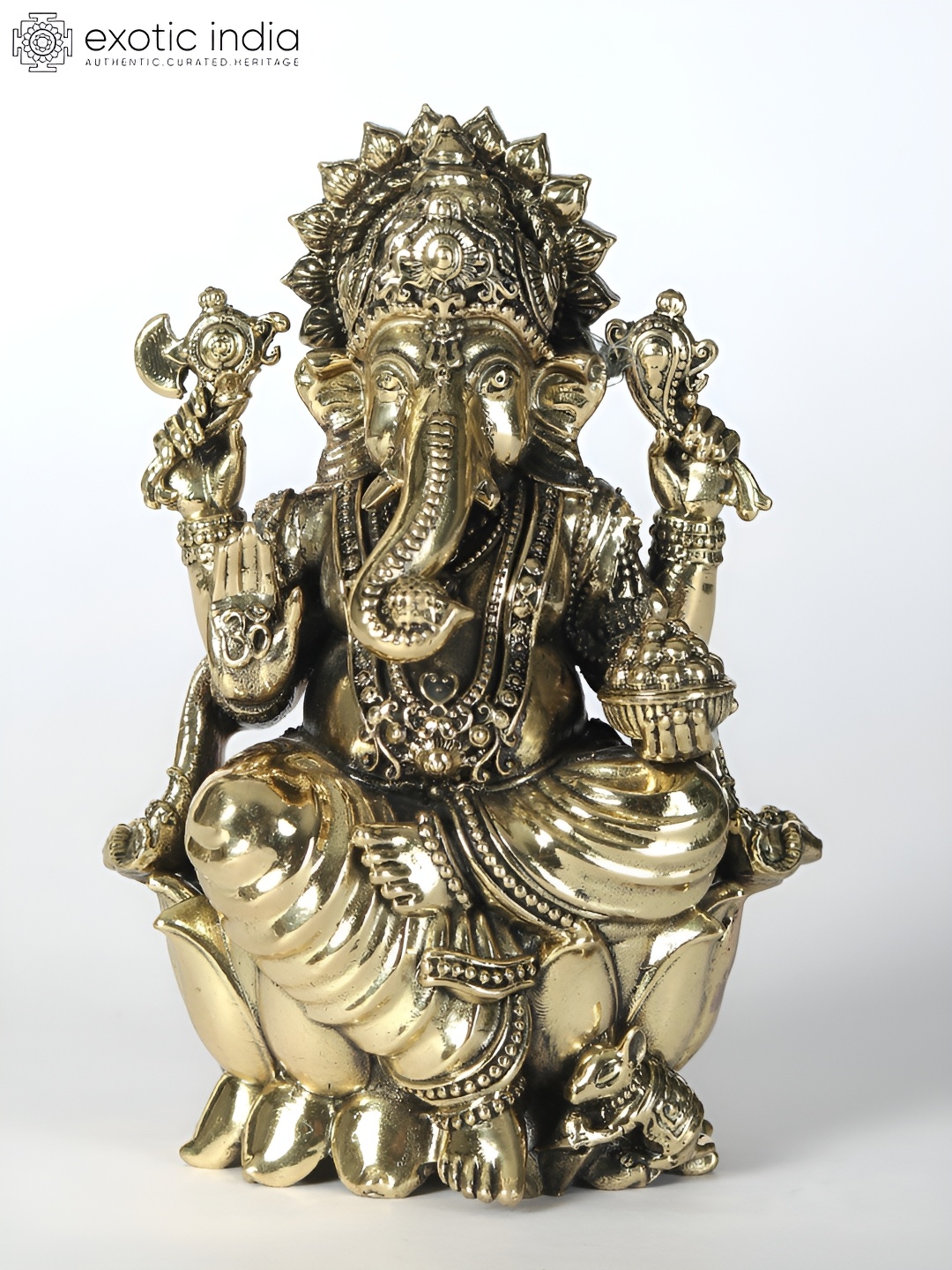 

Exotic India Gold Toned Religious Lord Ganapati Seated on Lotus Idol Showpiece