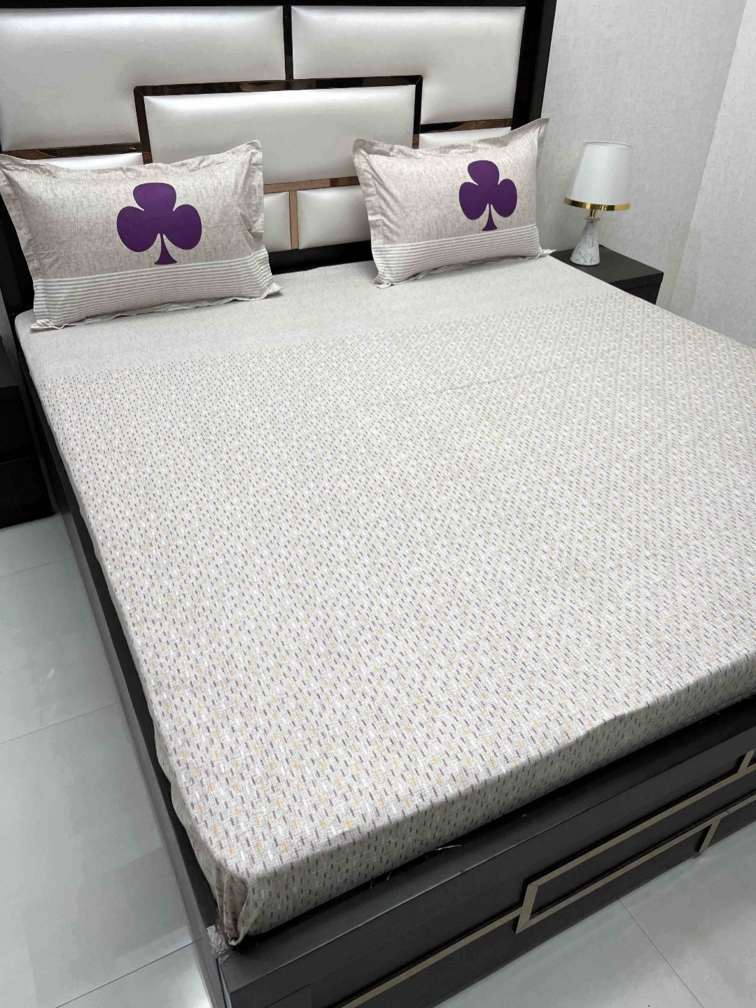 

Pure Decor White & Purple Printed 300 TC Pure Cotton King Bedsheet with 2 Pillow Covers