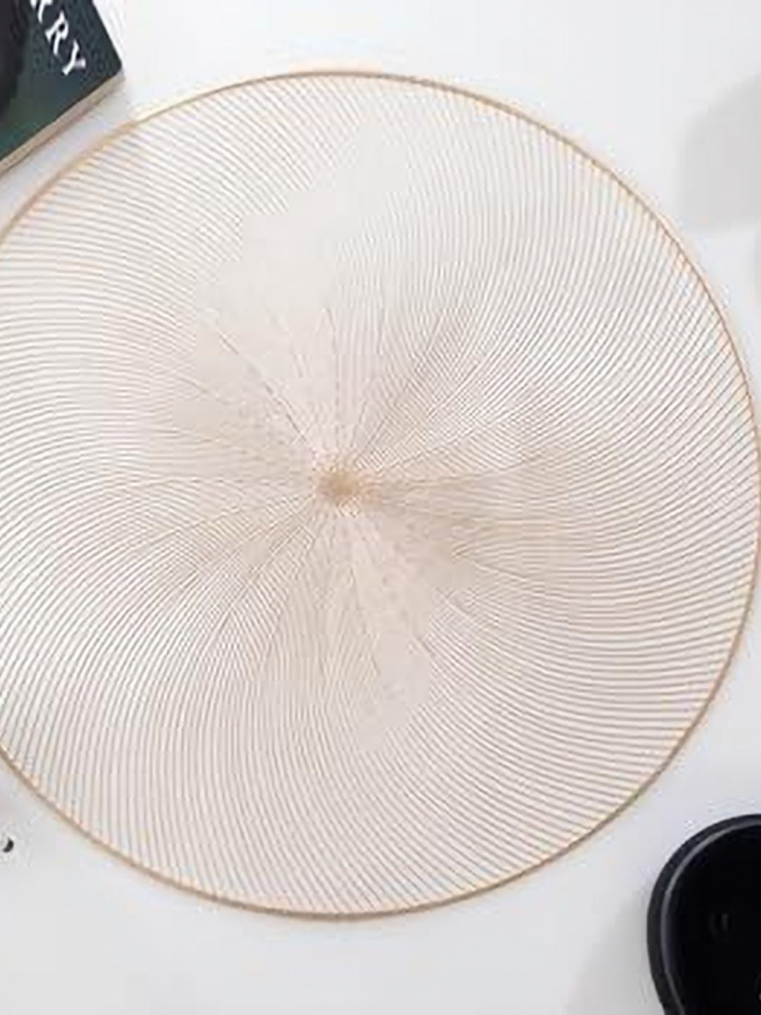 

HomeCloud Gold Toned Textured Round Shaped Table Placemat