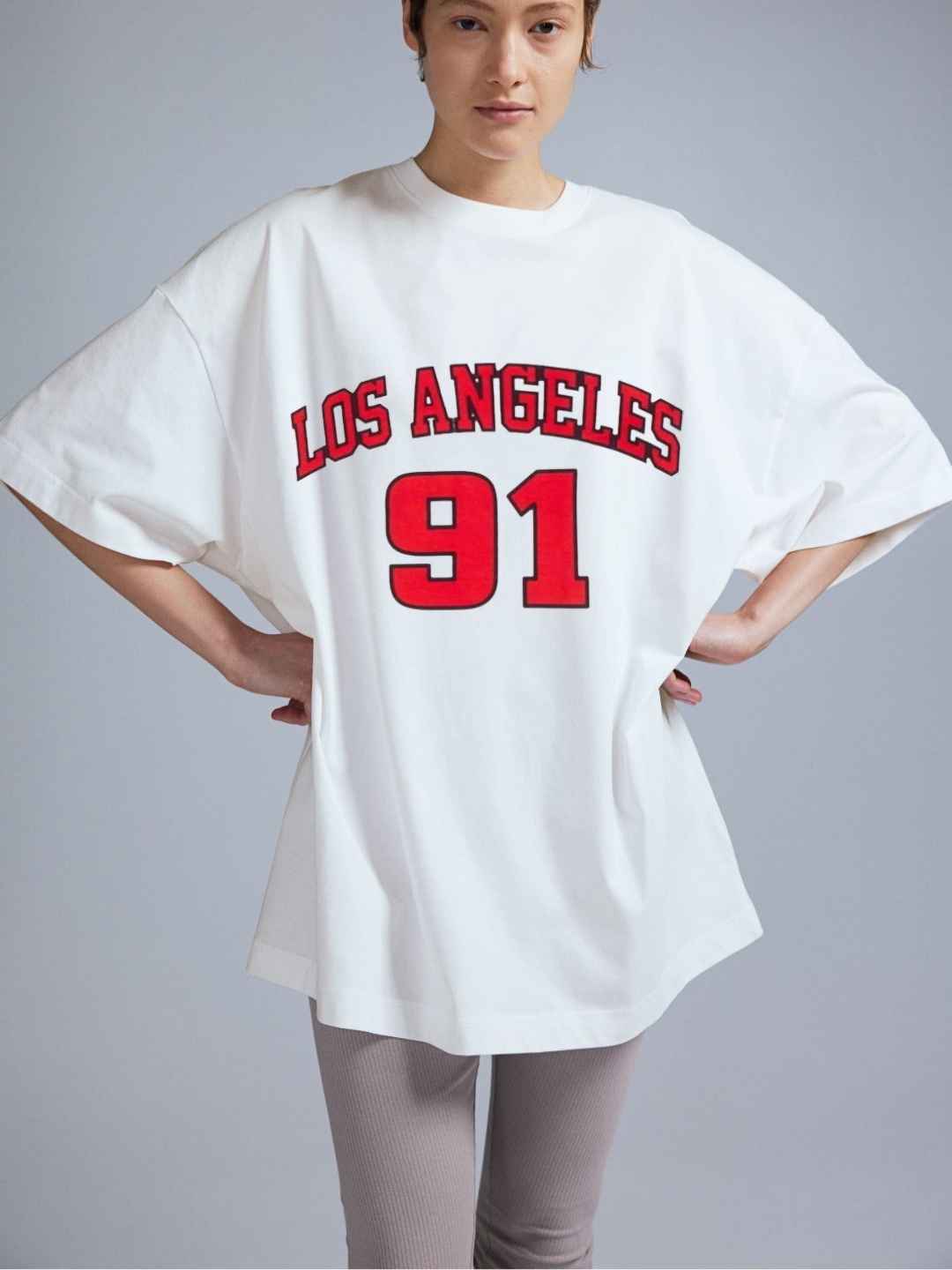 

REVEXO Women Varsity Printed Round Neck Cotton Oversized T-shirt, White