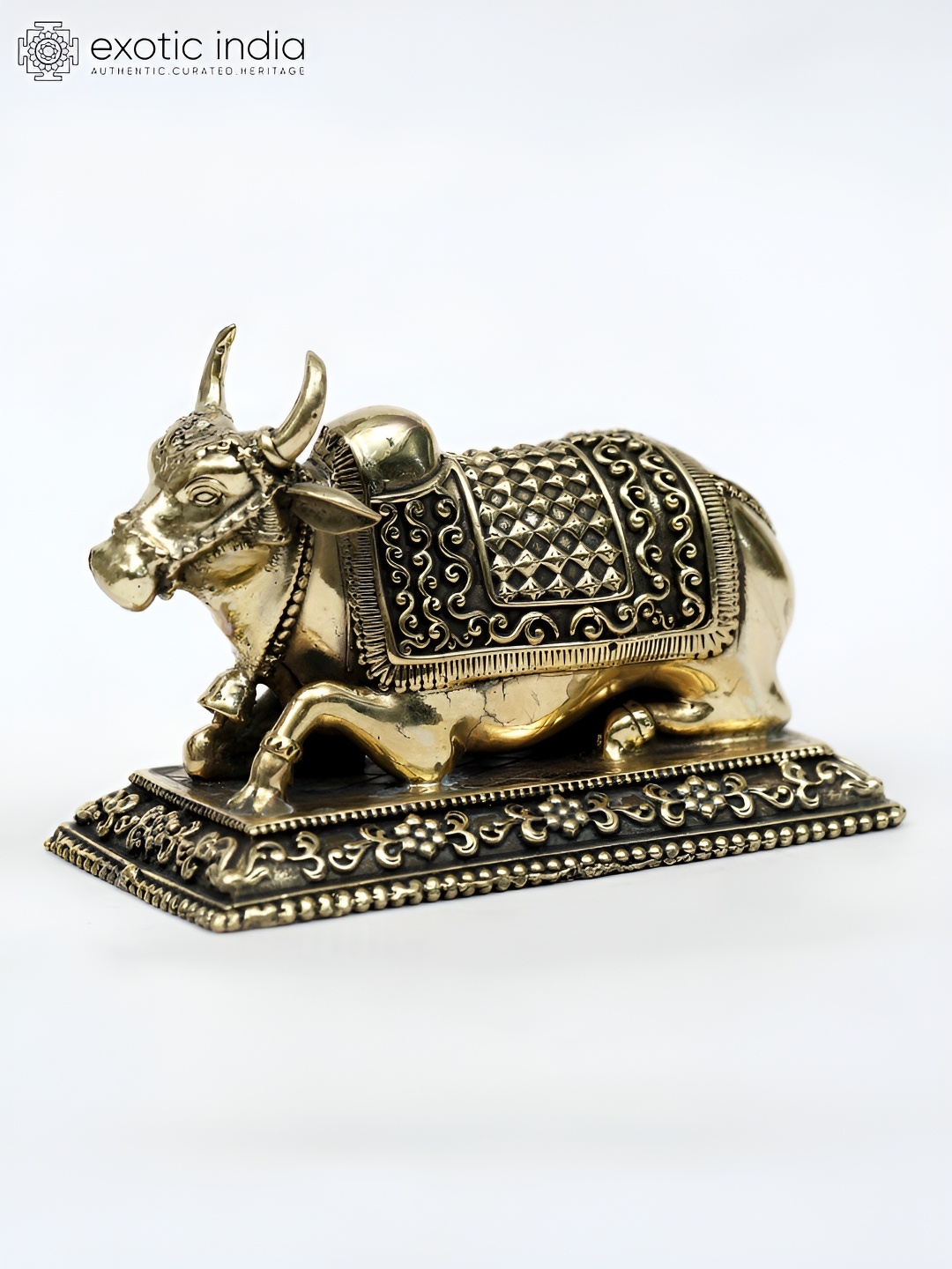 

Exotic India Gold-Toned Decorated Nandi Religious Figurine Showpiece