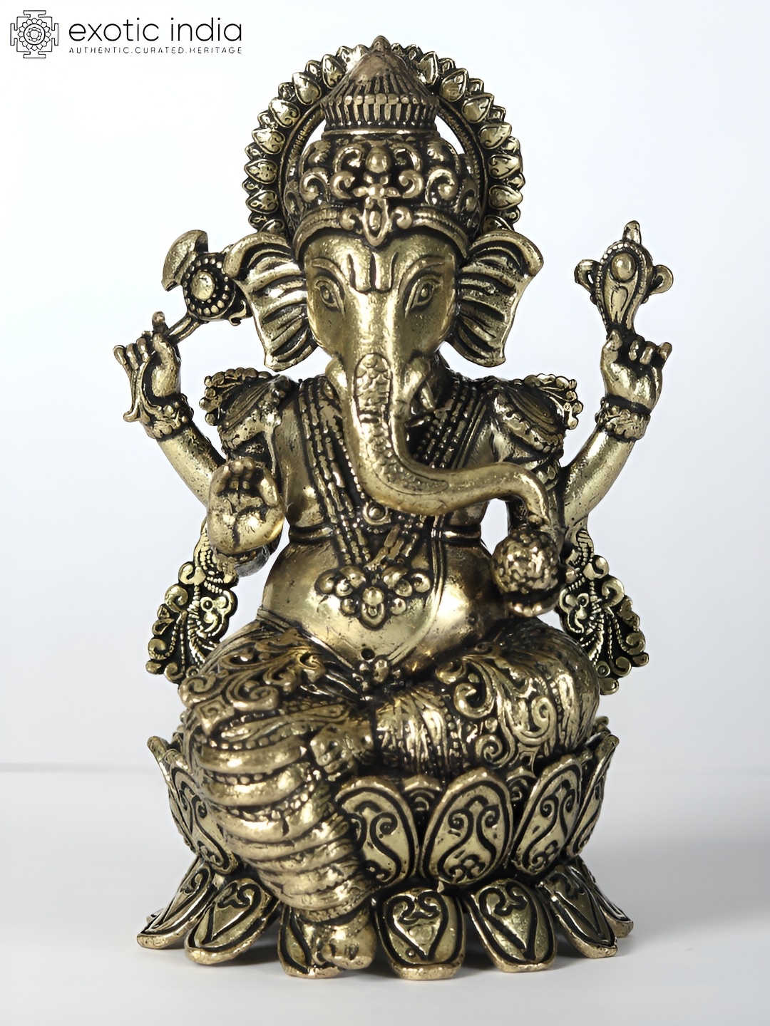 

Exotic India Gold Toned Religious Lord Ganesha Idol Showpiece