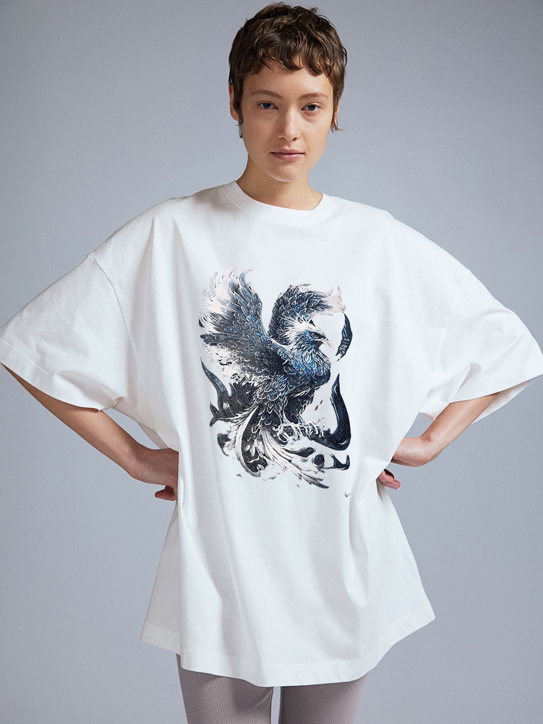 

REVEXO Women Graphic Printed Round Neck Cotton Oversized T-shirt, White