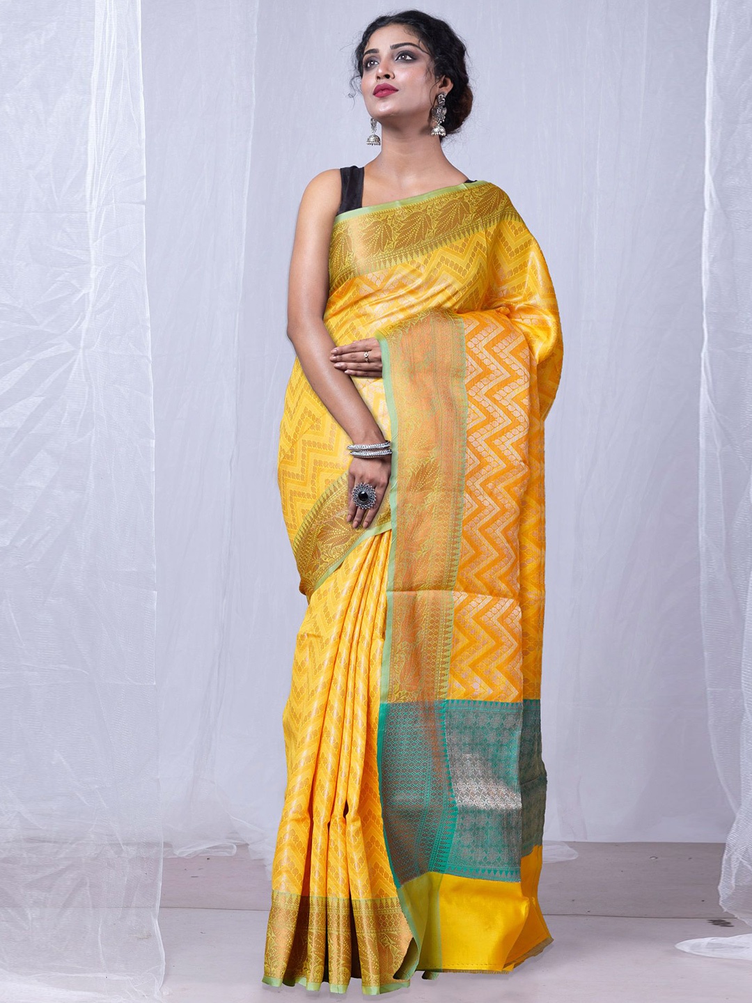 

Unnati Silks Woven Design Zari Tissue Handloom Banarasi Saree, Yellow