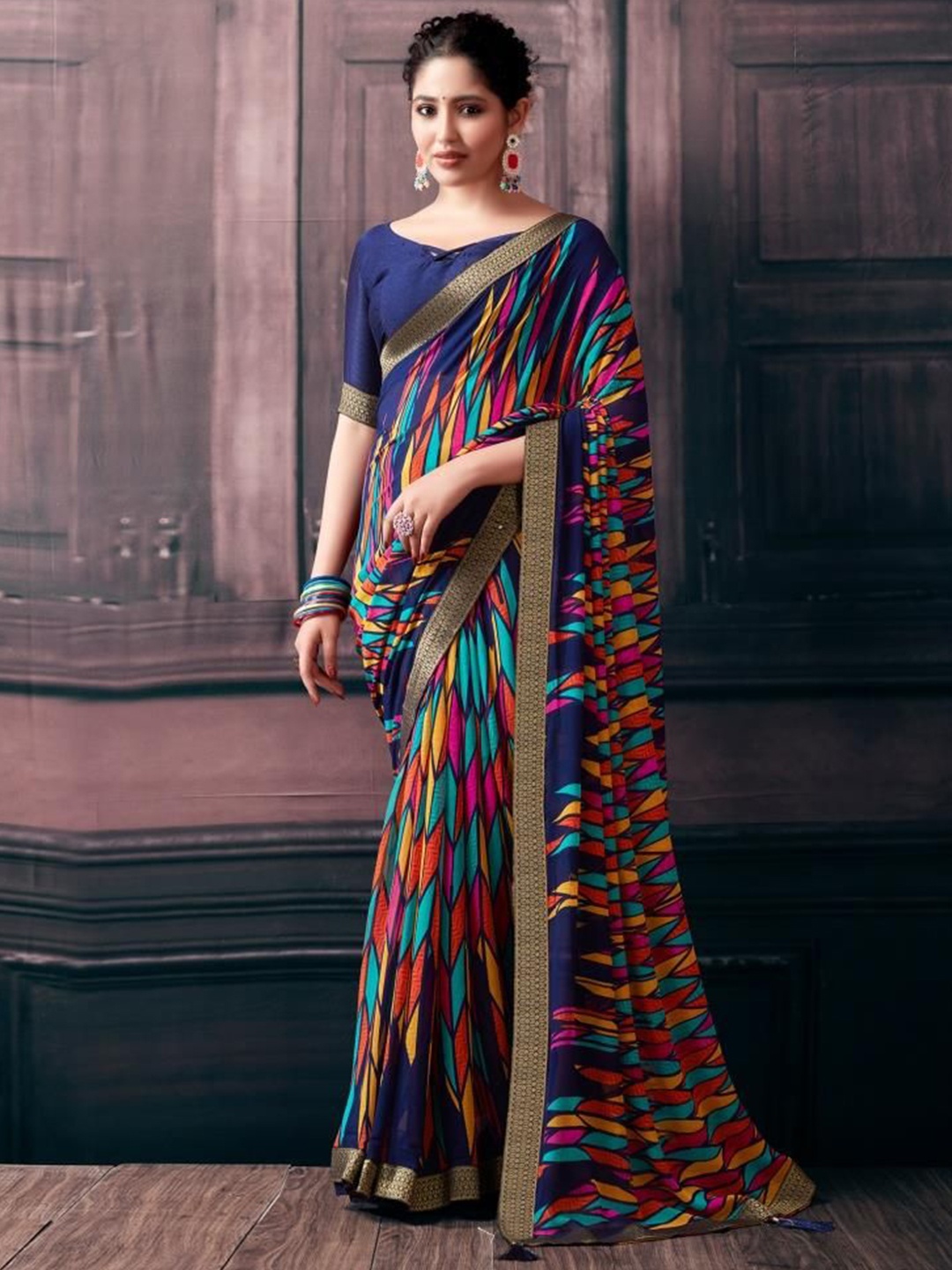 

Reboot Fashions Geometric Printed Zari Pure Chiffon Saree, Blue