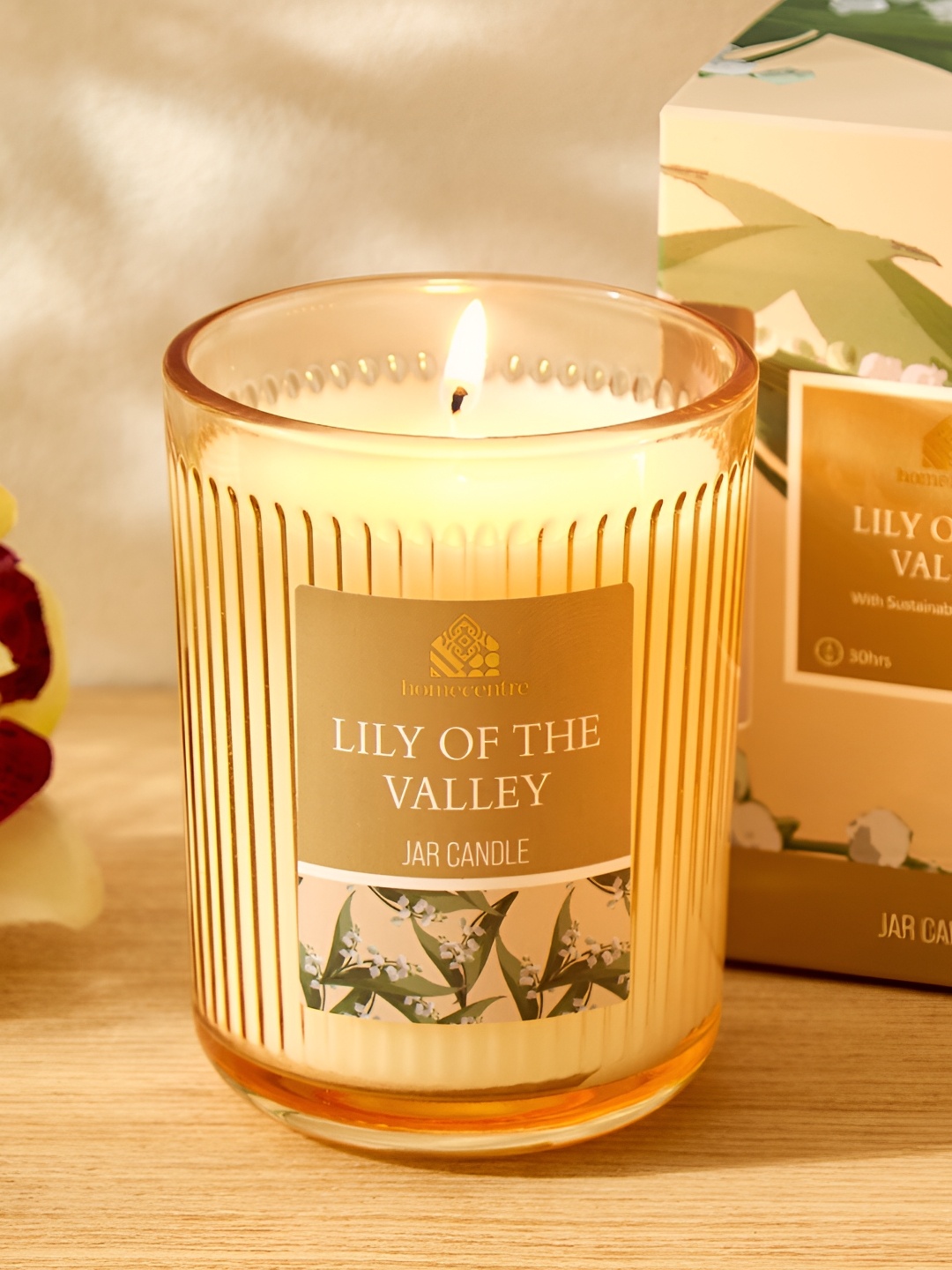 

Home Centre Yellow Jar Candle