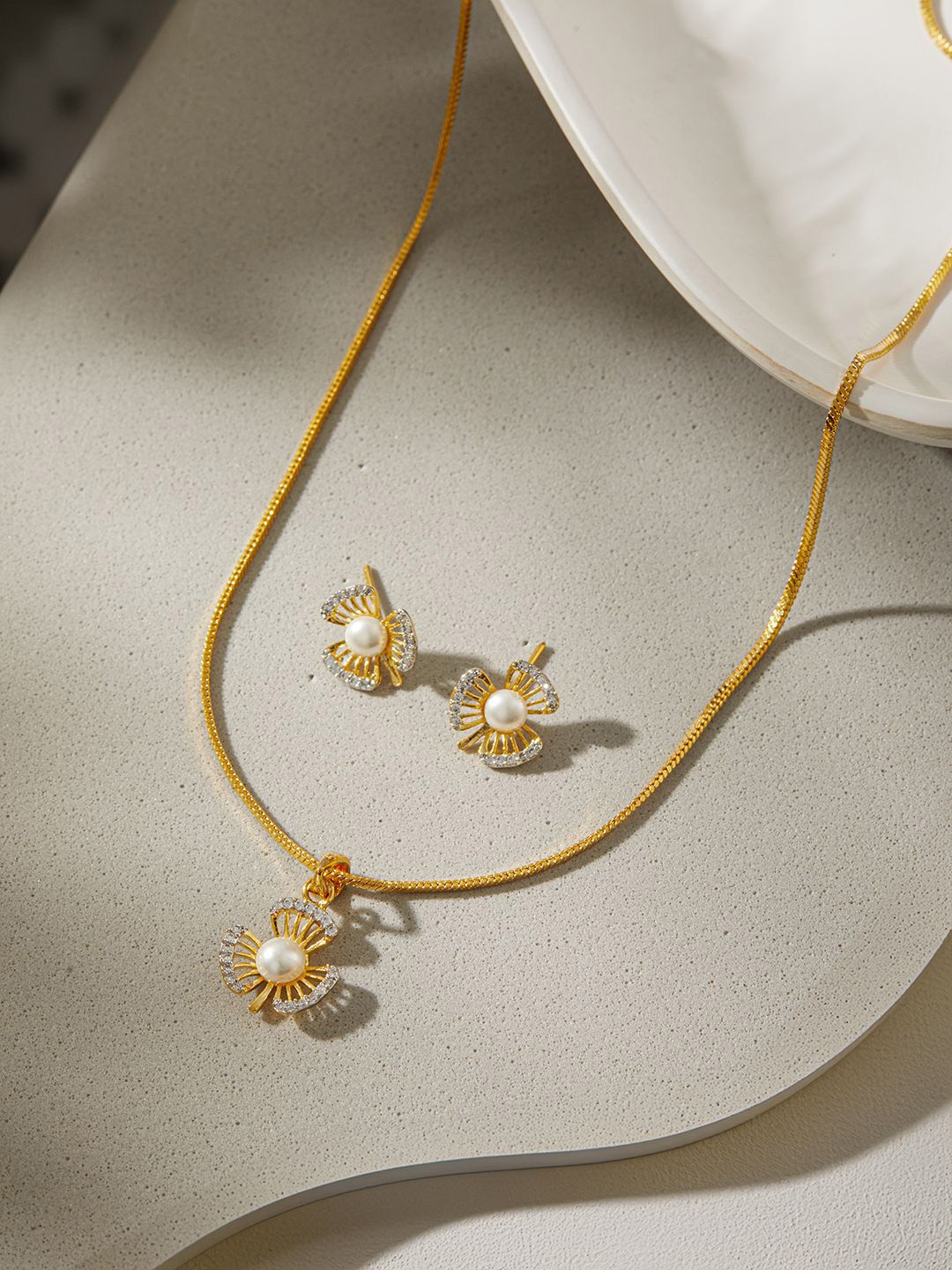 

Jazz and Sizzle Gold-Plated American Diamond Studded Jewellery Set