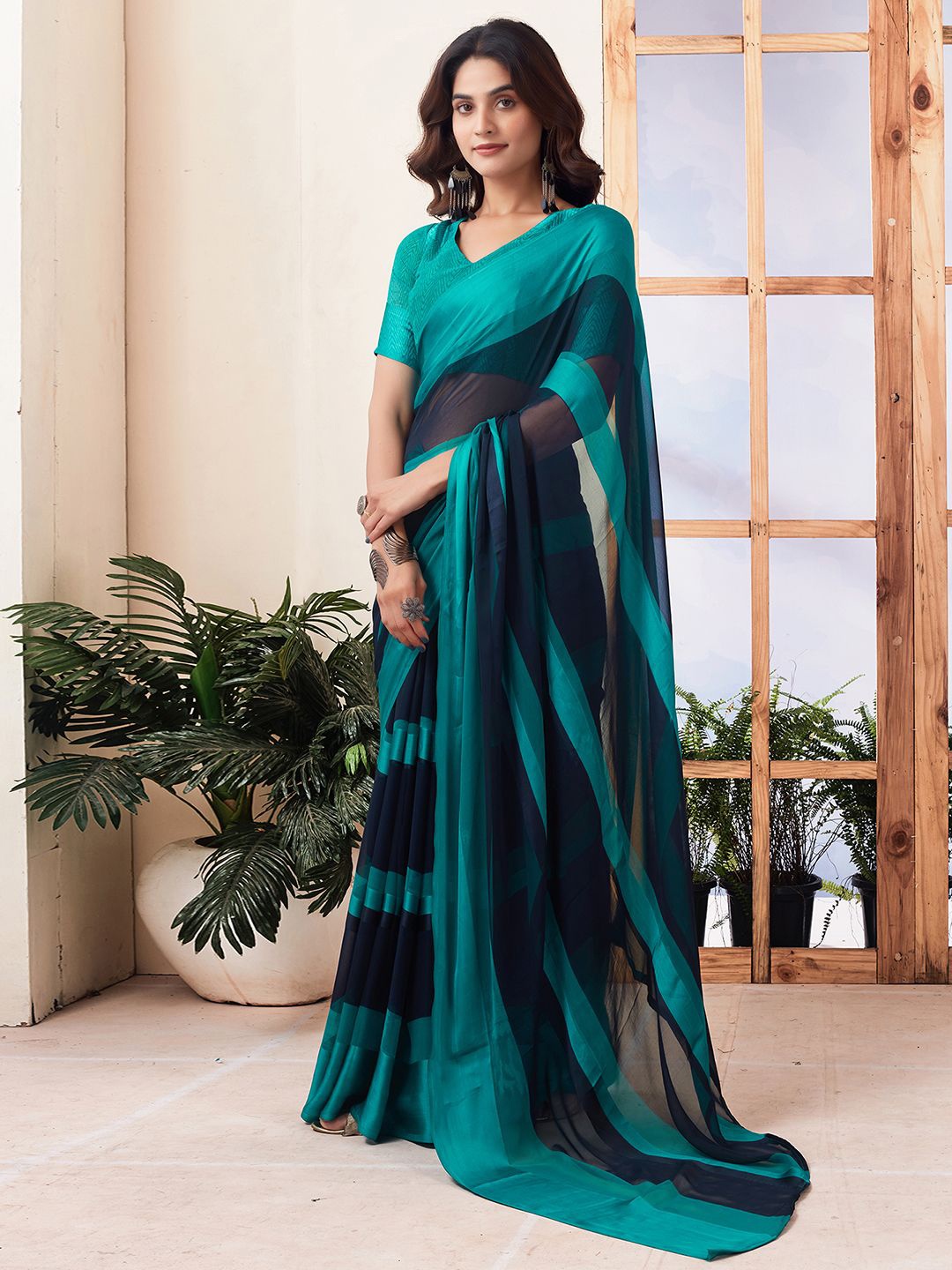 

KALINI Striped Printed Pure Georgette Saree, Blue