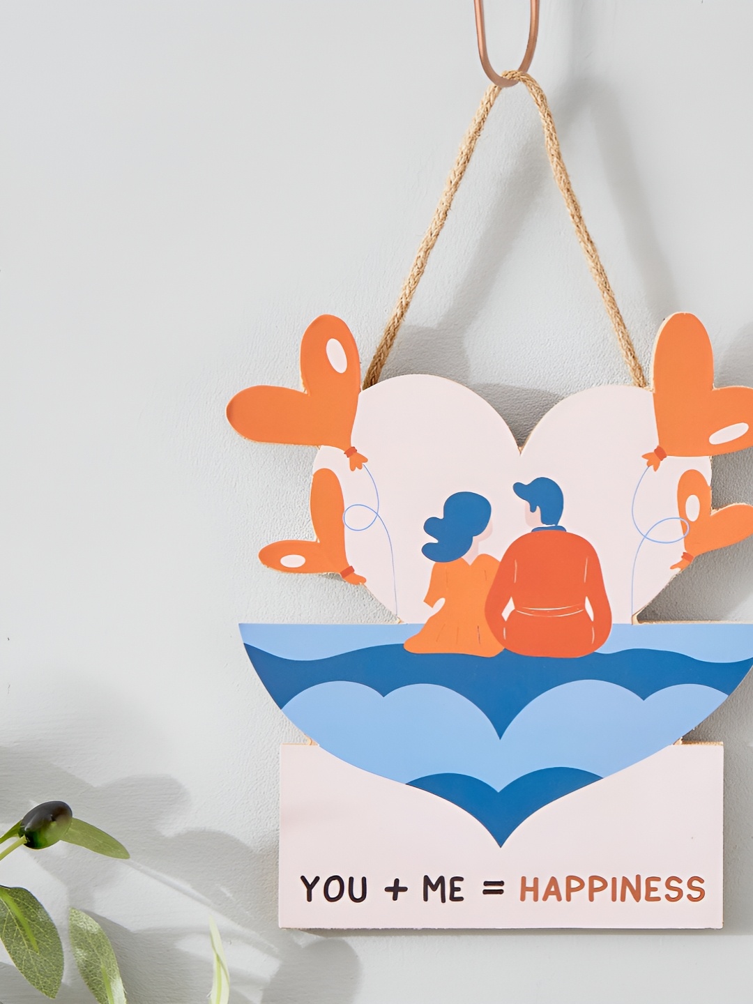 

Home Centre Garnet Pink & Blue Printed Wooden Wall Hanging