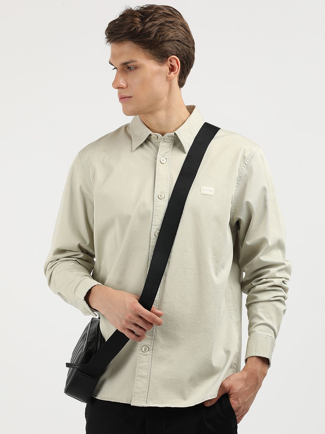 

Calvin Klein Jeans Men Spread Collar Solid Cotton Relaxed Fit Casual Shirt, Beige