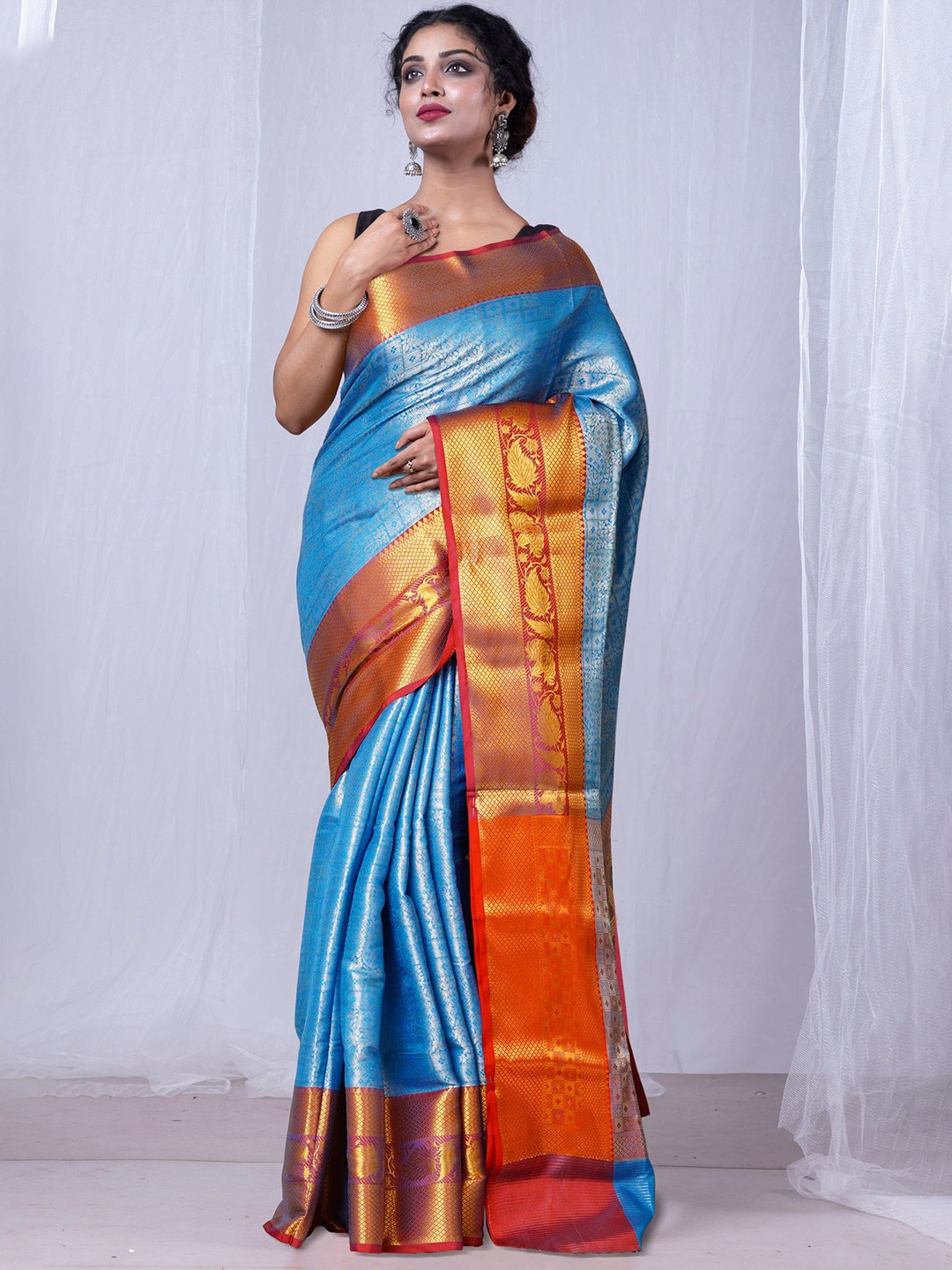 

Unnati Silks Woven Design Tissue Handloom Banarasi Saree, Turquoise blue