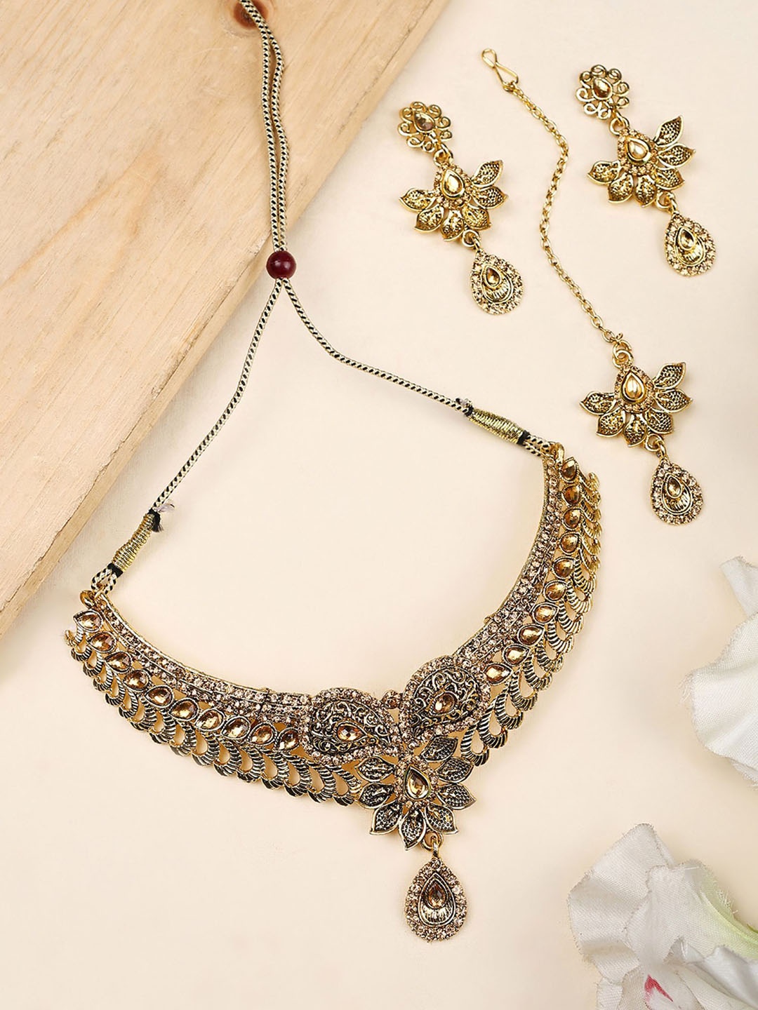 

ANIKAS CREATION Gold-Pated Cubic Zirconia Stone Studded Jewellery Set