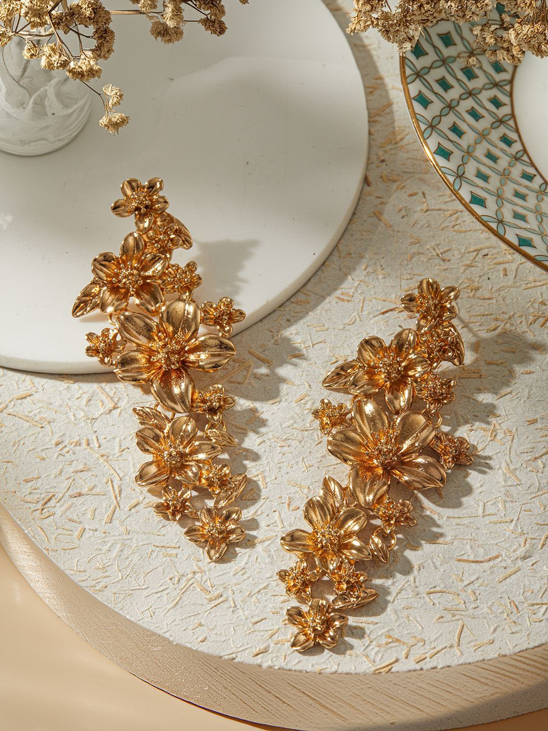 

Jazz and Sizzle Gold Plated Floral Shaped Drop Earrings