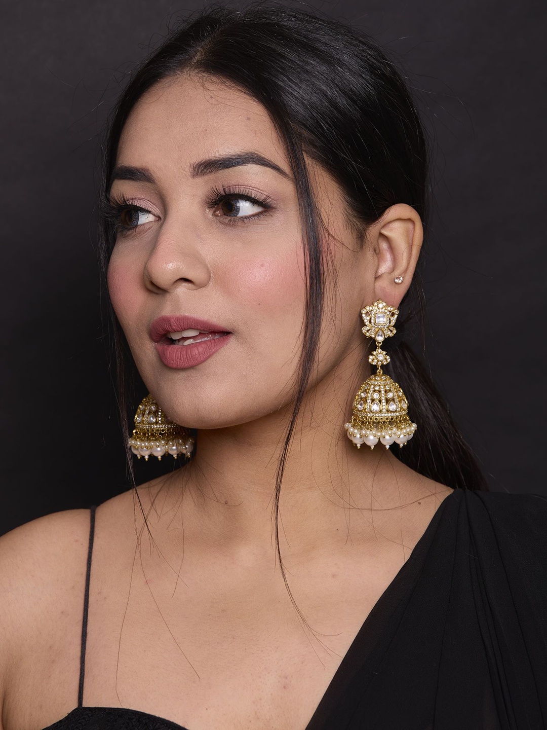 

Amreli Jaipur Gold-Plated Kundan Studded Contemporary Jhumkas
