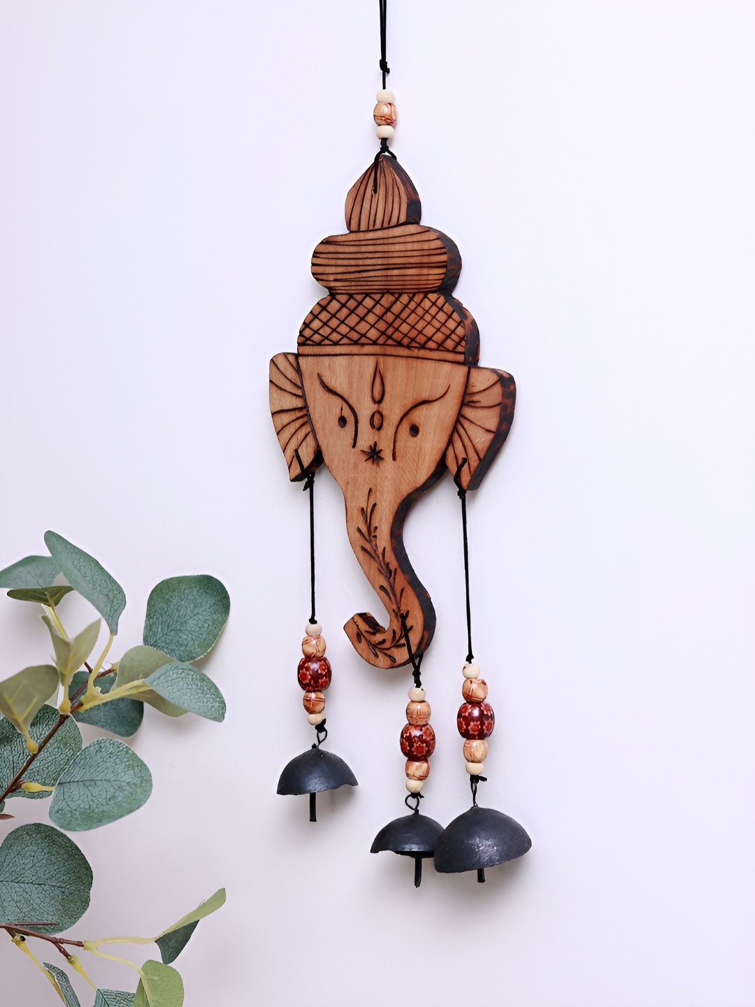 

Unravel India Brown & Black Printed Ganesha Motif Windchimes With Embedded Bells