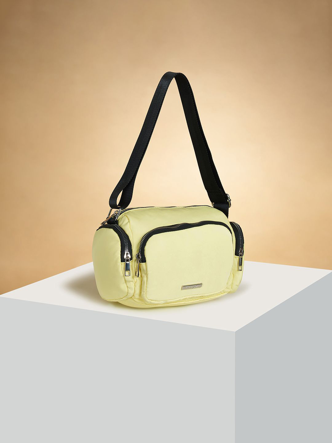 

Forever Glam by Pantaloons Women Structured Sling Bag, Yellow