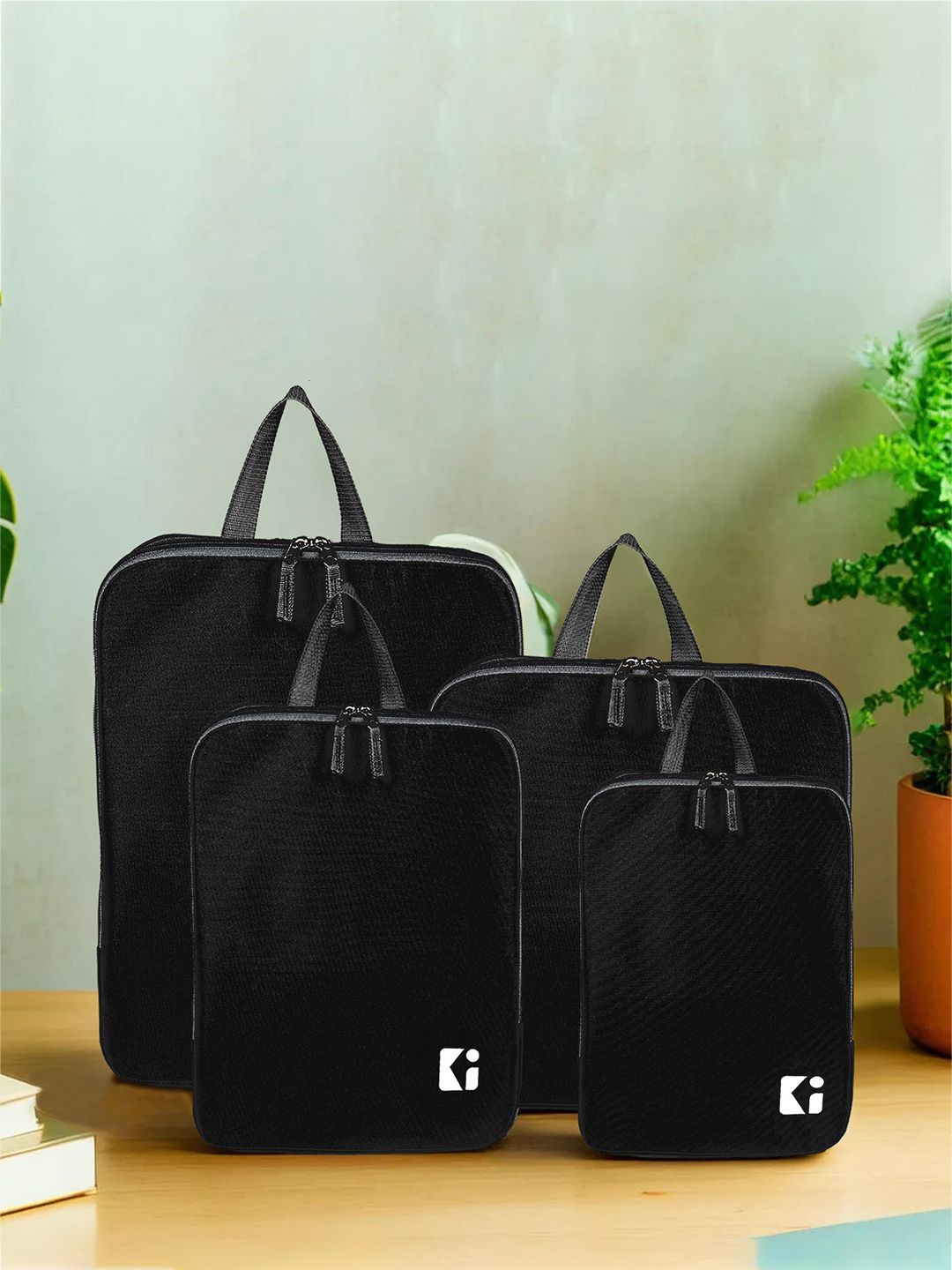 

Kuber Industries Set of 12 Waterproof Travel Kit With Handles, Black