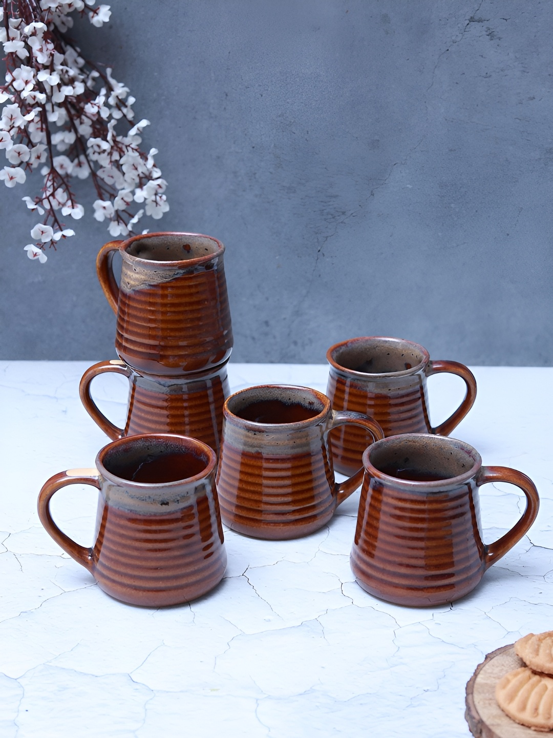 

Unravel India Ceramic Ripple Brown 6 Pieces Printed Ceramic Matte Mugs 140 ml
