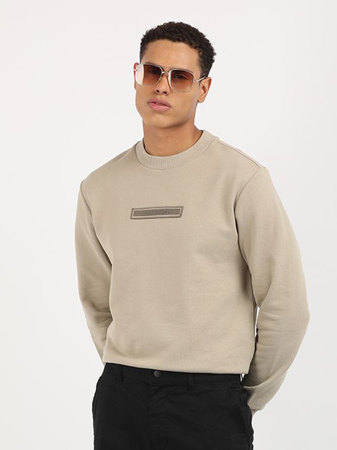 

Calvin Klein Jeans Men Solid Round Neck Cotton Pullover Sweatshirt, Beige