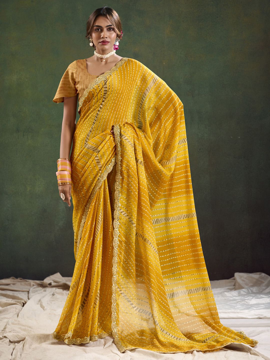 

Anouk Striped Printed Embellished Sequined Saree, Mustard
