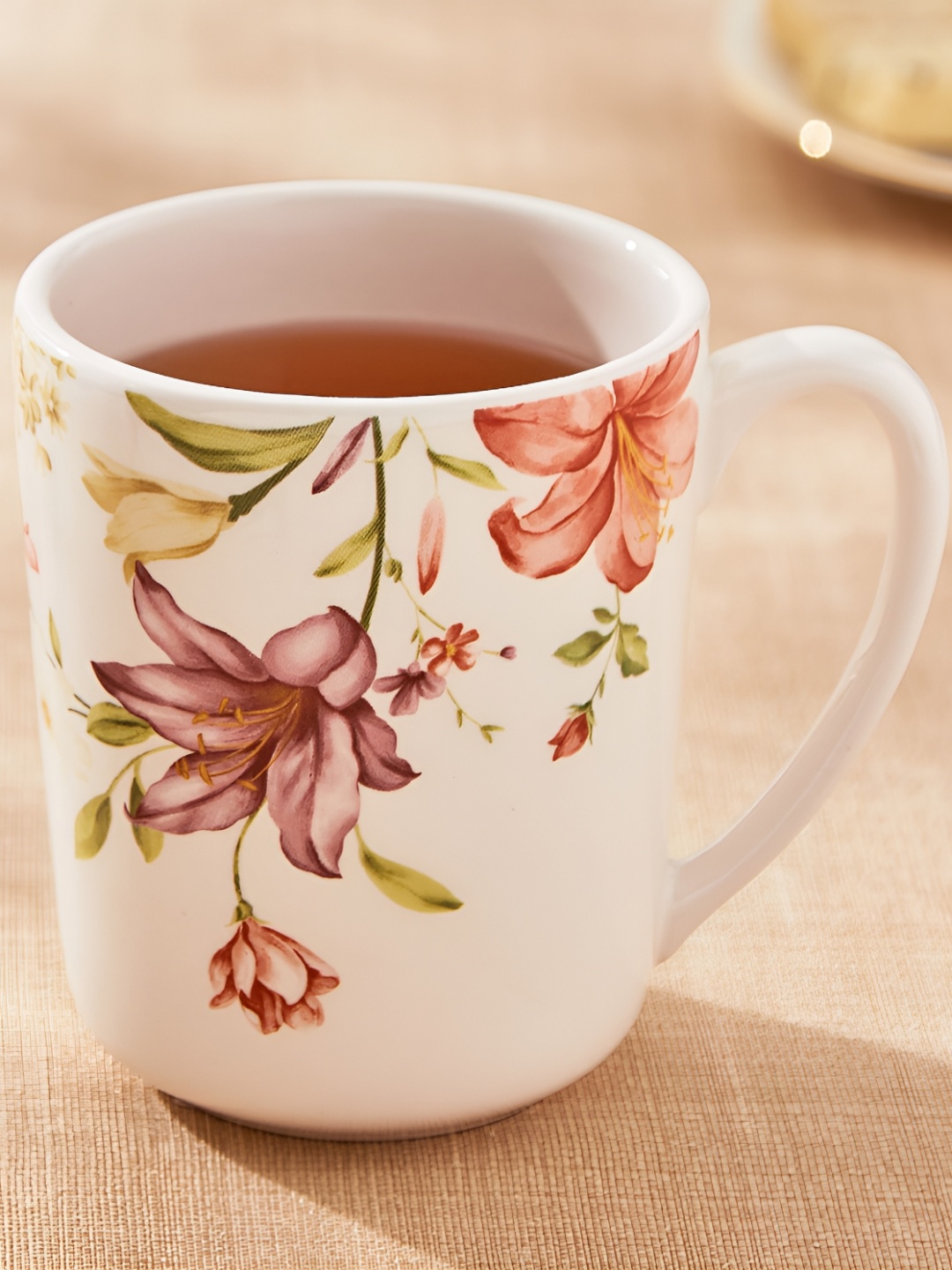 

Home Centre White & Purple Printed Stoneware Glossy Coffee Mug - 480ml