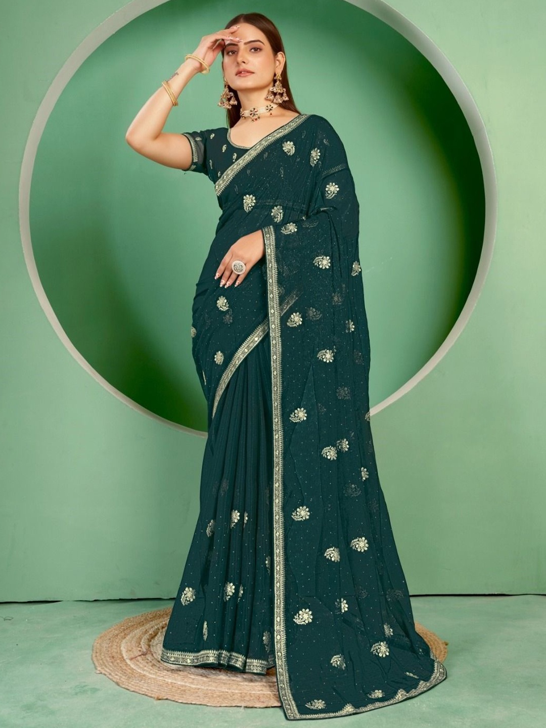 

Kalista Ethnic Motifs Embroidered Pure Georgette Saree, Green