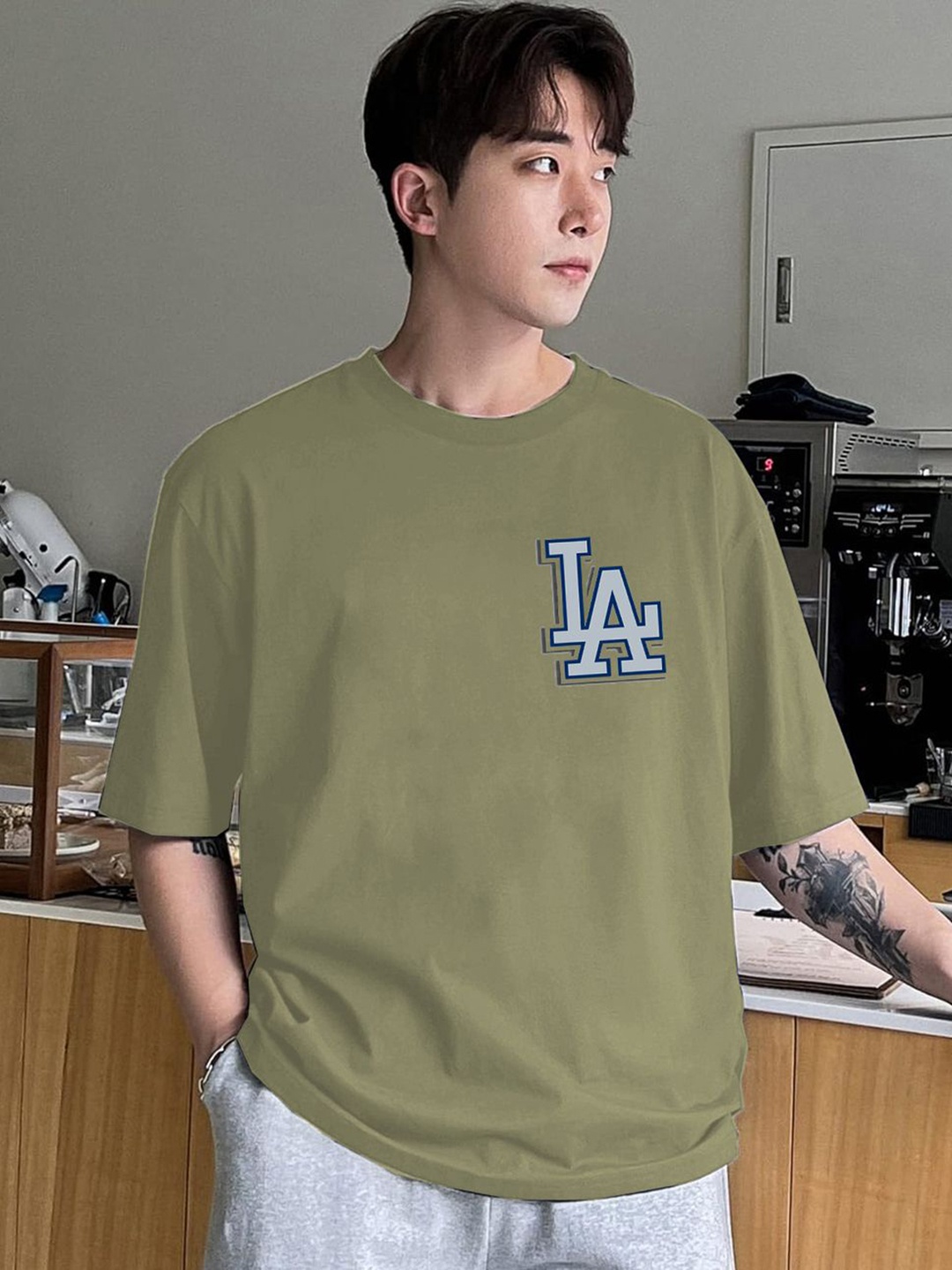 

Genzy Men Typography Printed Drop-Shoulder Sleeves Cotton T-shirt, Teal