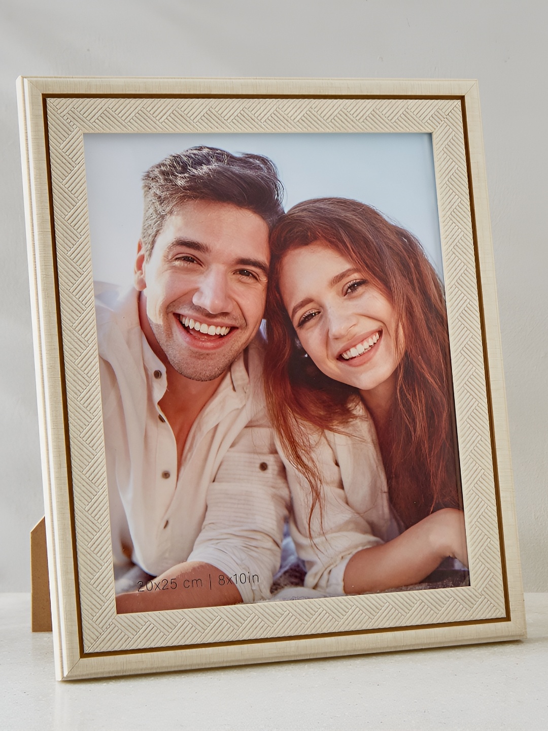 

Home Centre Photomontage Beige MDF Table Photo Frames