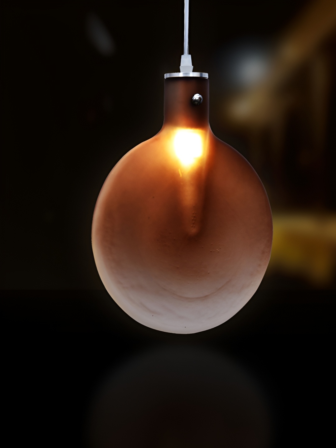 

Homesake Brown Glass Spherical Shaped Ceiling Lamp