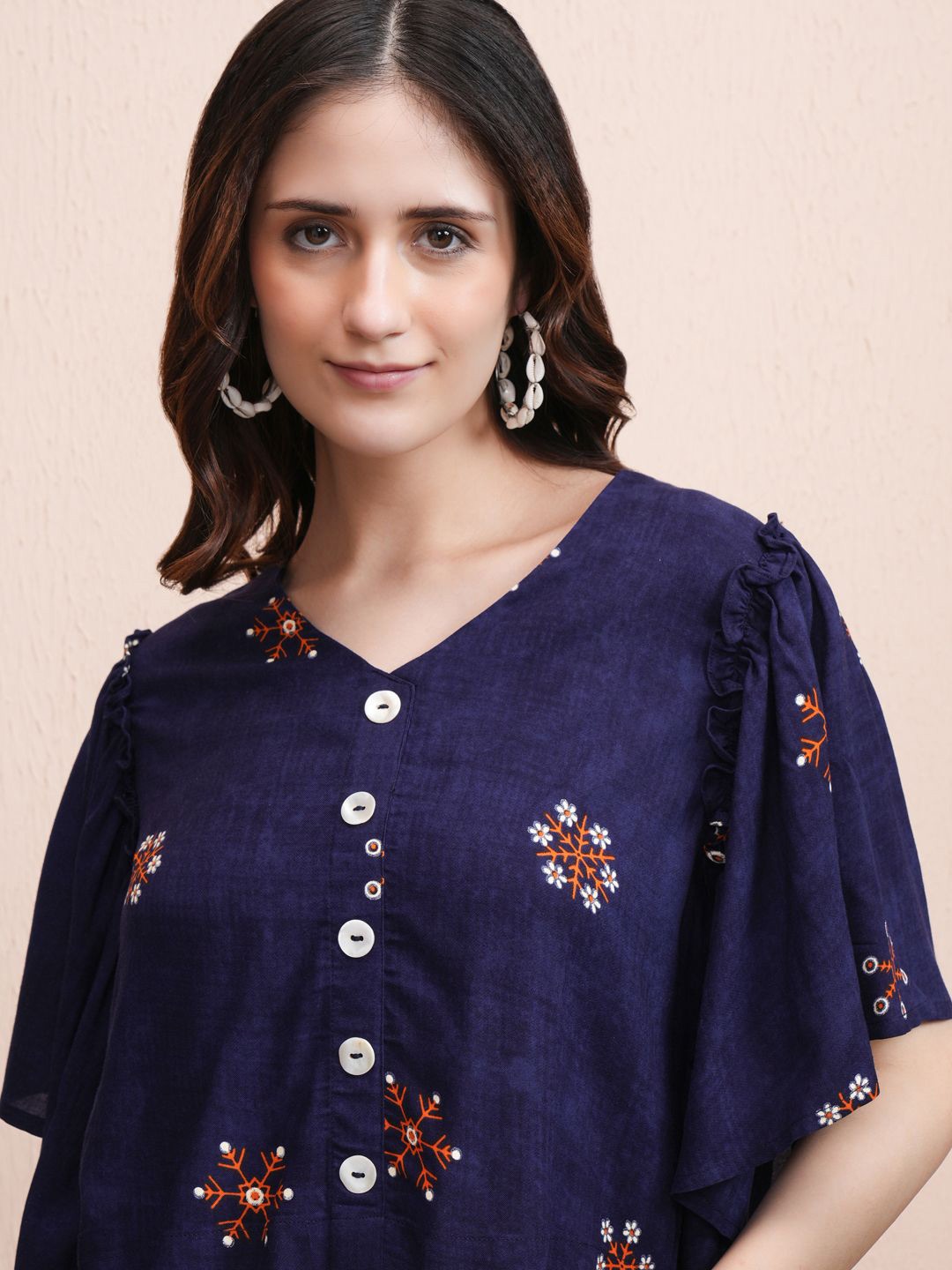 

Vishudh Women Floral Embroidered V-Neck Top, Navy blue