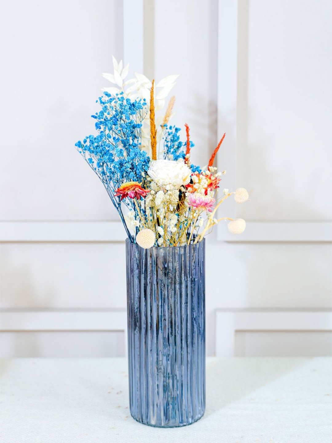 

ArteCasa Blue Textured Ceramic Horizon Flower Vase