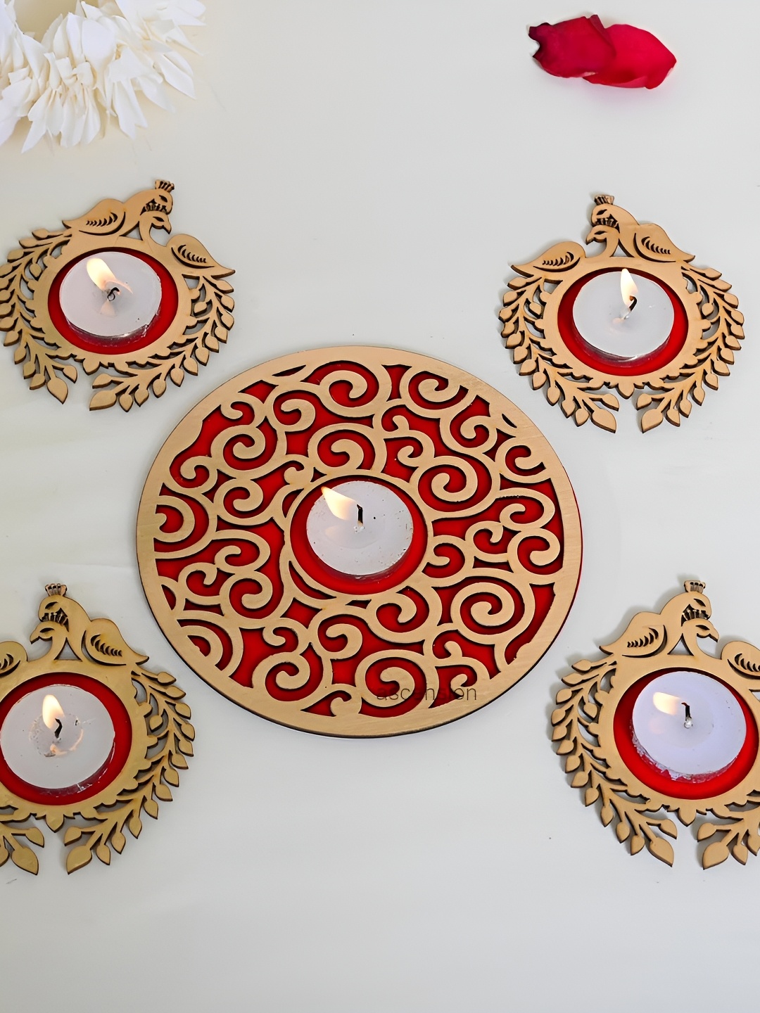 

Ascension Red & Gold Toned 5 Pieces Wooden Peacock Design Rangoli Set With Tealights