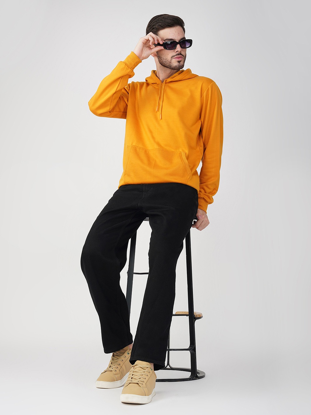 

The Roadster Lifestyle Co. Men Solid Hood Cotton Pullover Sweatshirt, Mustard