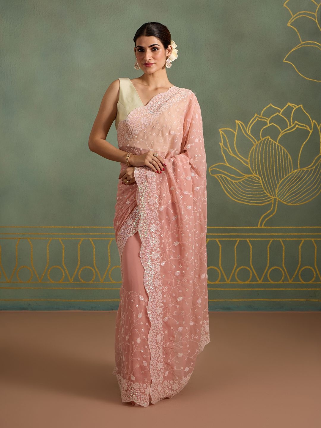 

Likha Solid Floral Embroidered Embelished Pure Georgette Party Saree, Peach